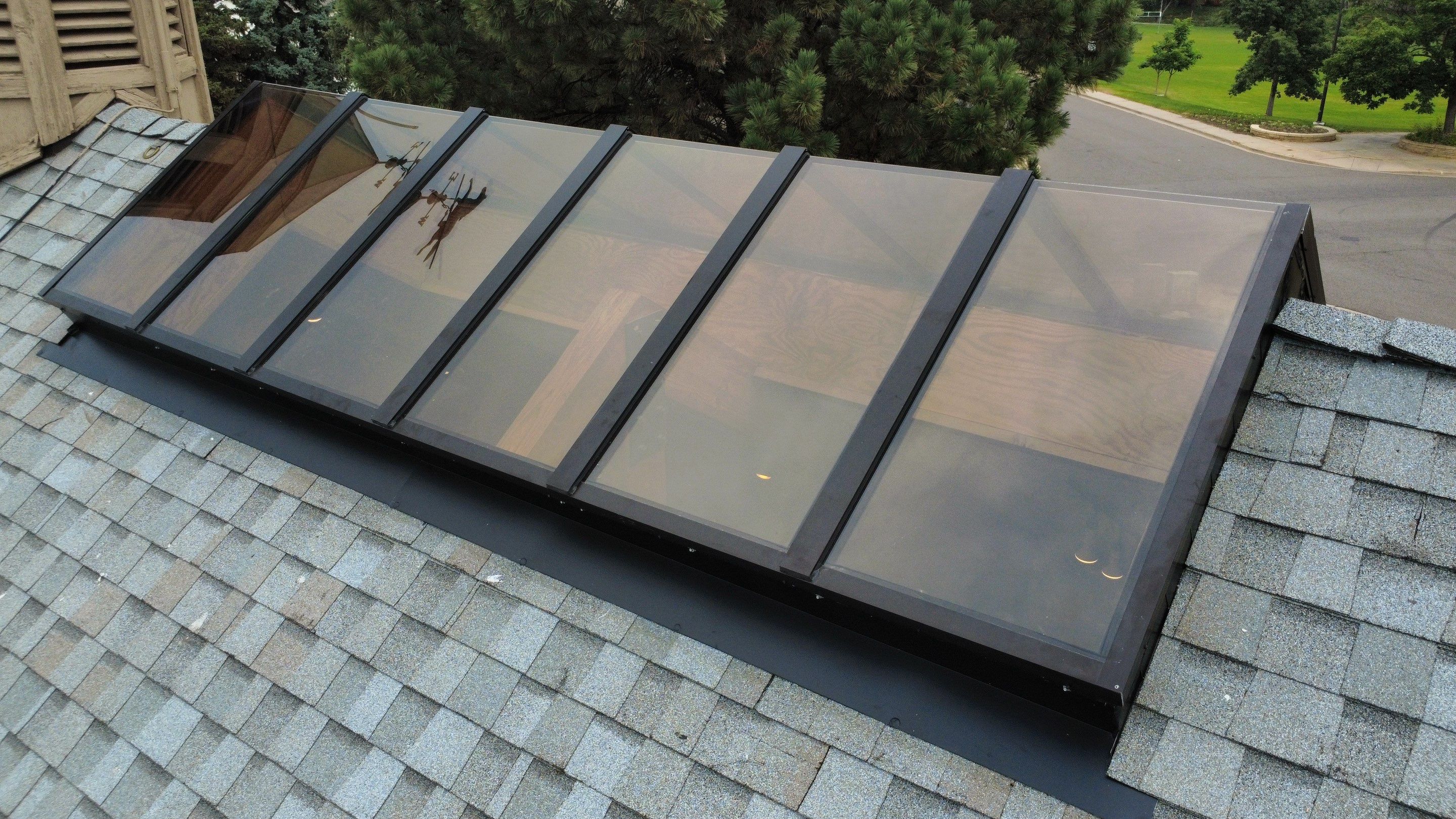 Asphalt Shingle and Skylight Replacement Project in Denver, CO by Blue Peaks Roofing LLC 