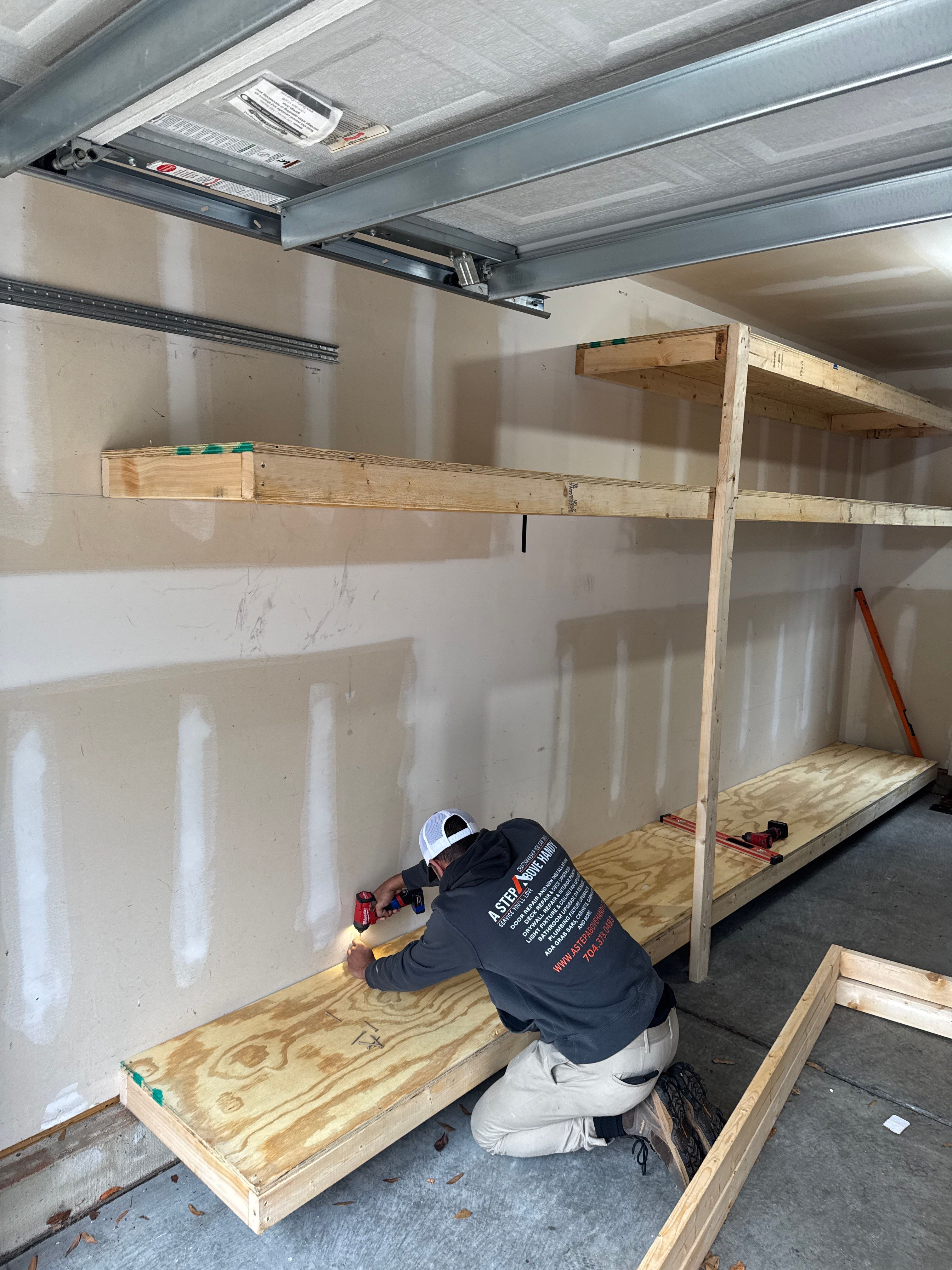 Custom "Climb-Tested" Garage Storage by A Step Above Handy LLC