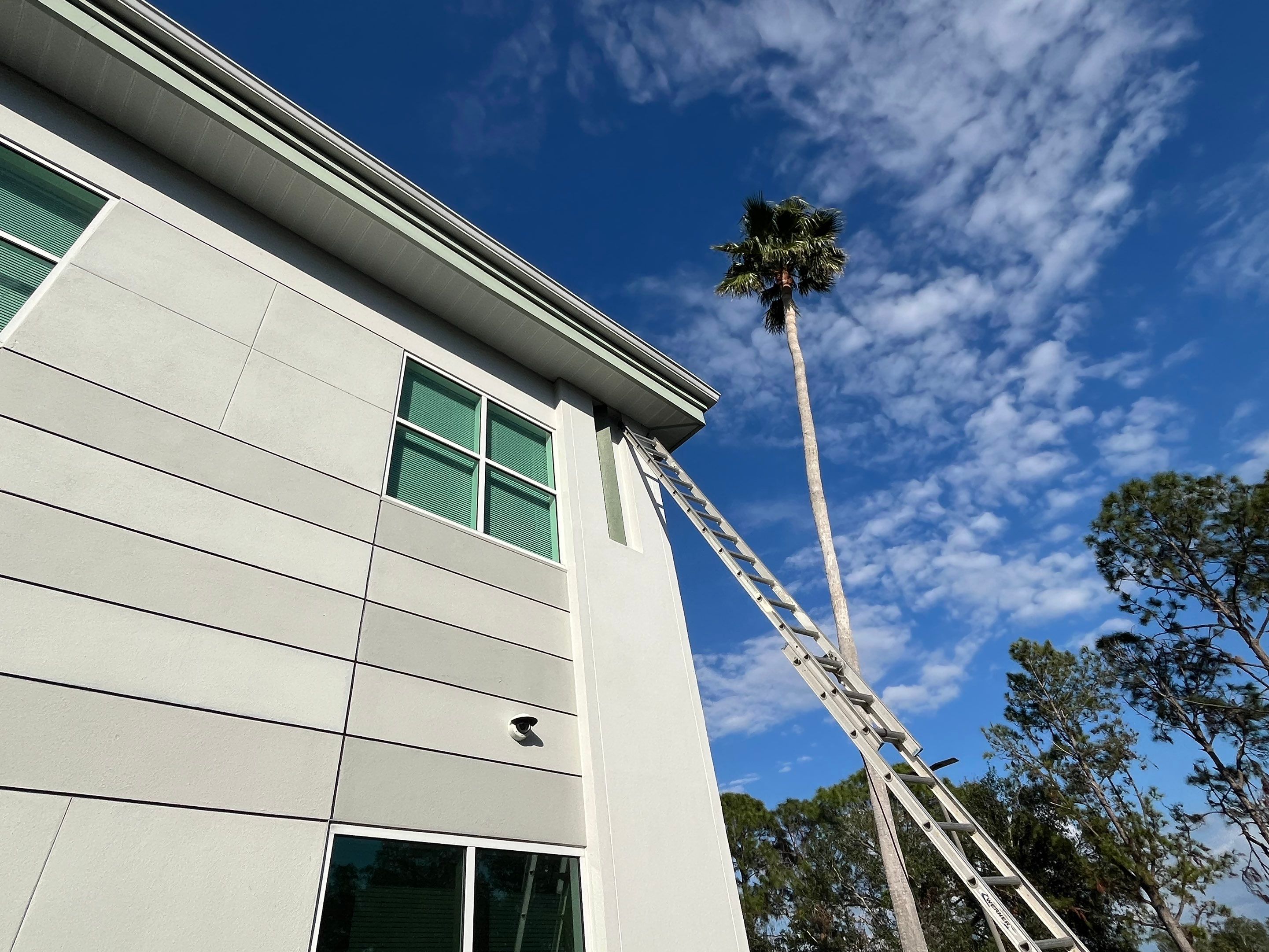 White Soffit and Fascia Repair Project in Sarasota FL by Gutter Professors