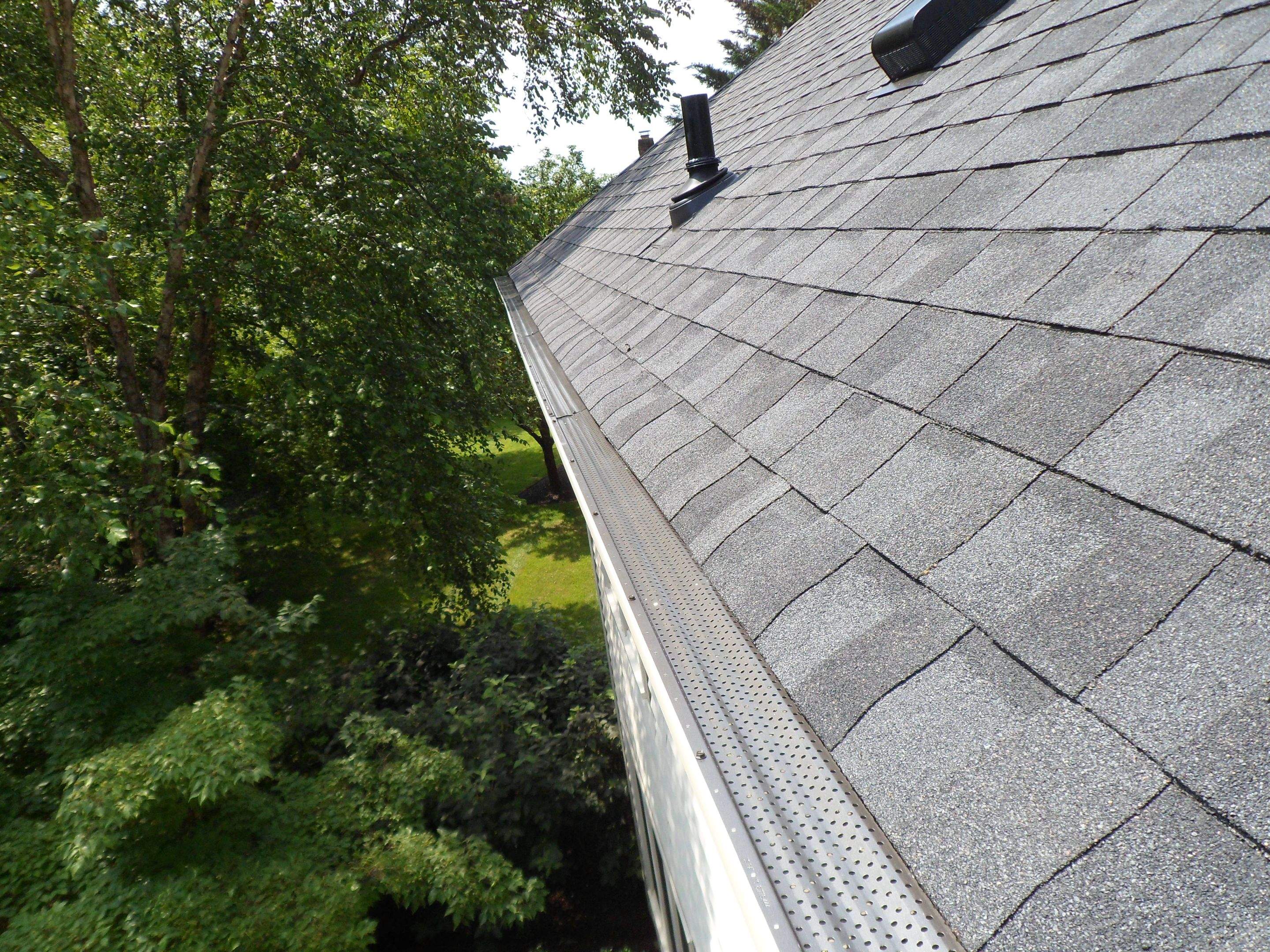 New Shingle Roof & New Gutters and downspouts with covers by Alpha Design Services
