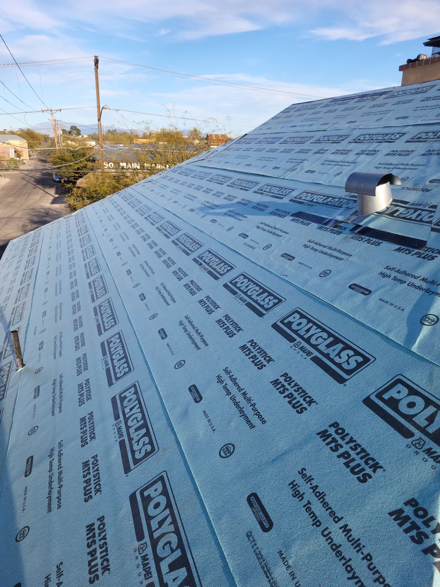 Metallic Silver Exposed Fastener by Reimagine Roofing