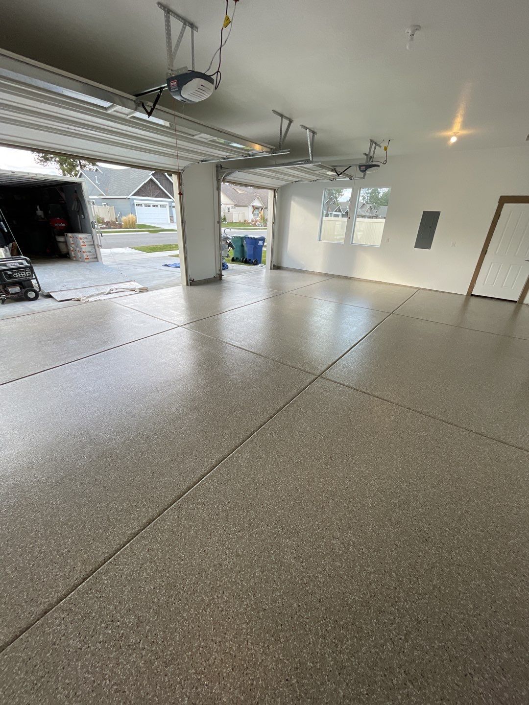 Garage Transformation using Pebble Beach by Croc Coatings, LLC