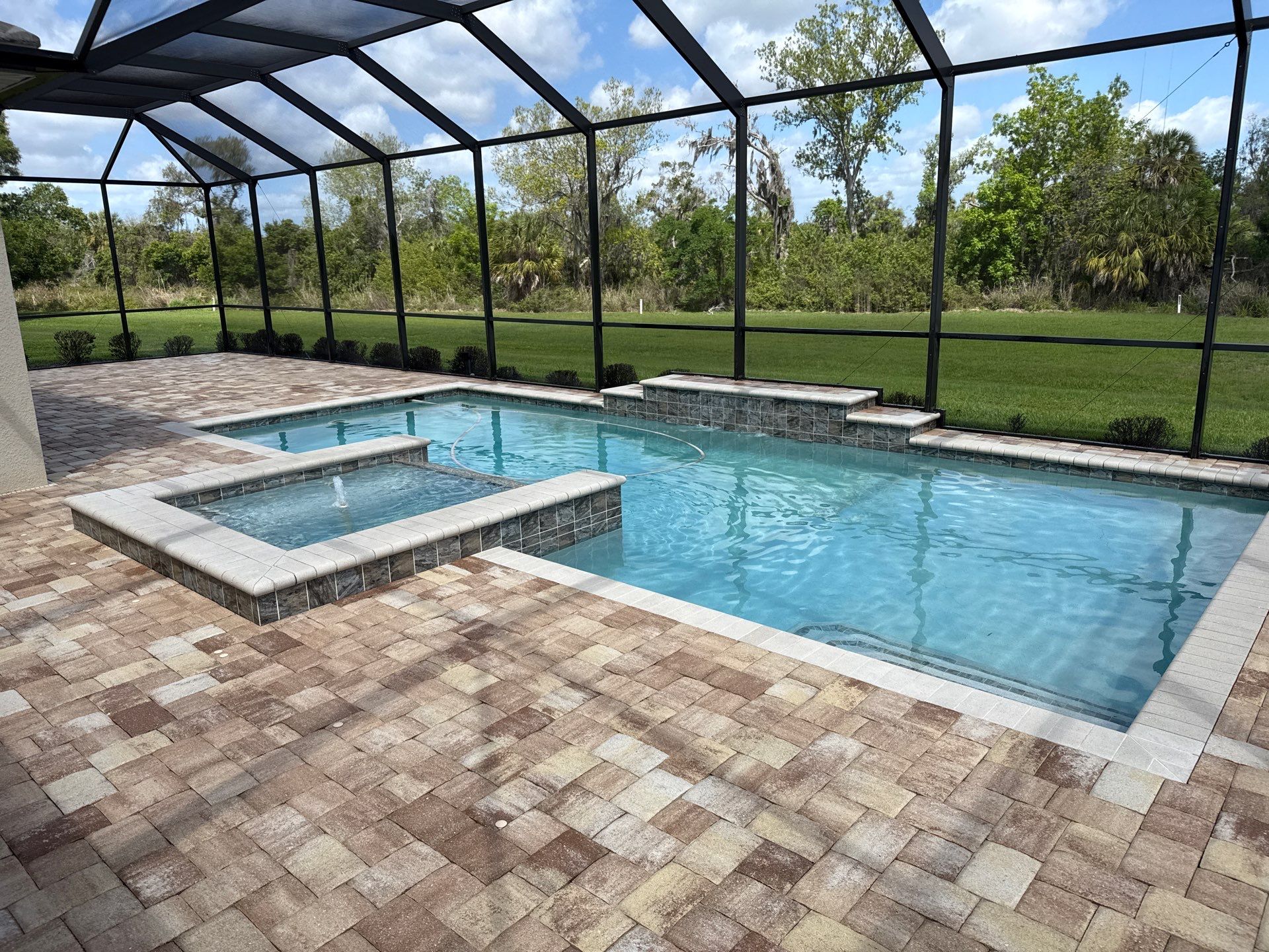 We recently completed a tile roof cleaning in the Vivienda at Bradenton community. The roof had visible algae buildup, which is common in Florida’s humid climate—especially on shaded areas.  For this project, we safely cleaned the roof using a ladder and ground-based soft wash application—no walking on the tile roof. This approach helps prevent cracked or broken tiles while still delivering a thorough, even cleaning.  Our soft washing process targets and eliminates algae at the root, restoring the roof’s appearance and helping extend its lifespan.  At Sunshine AquaWash, we prioritize safety, proper technique, and long-lasting results on every roof cleaning project. by Sunshine AquaWash