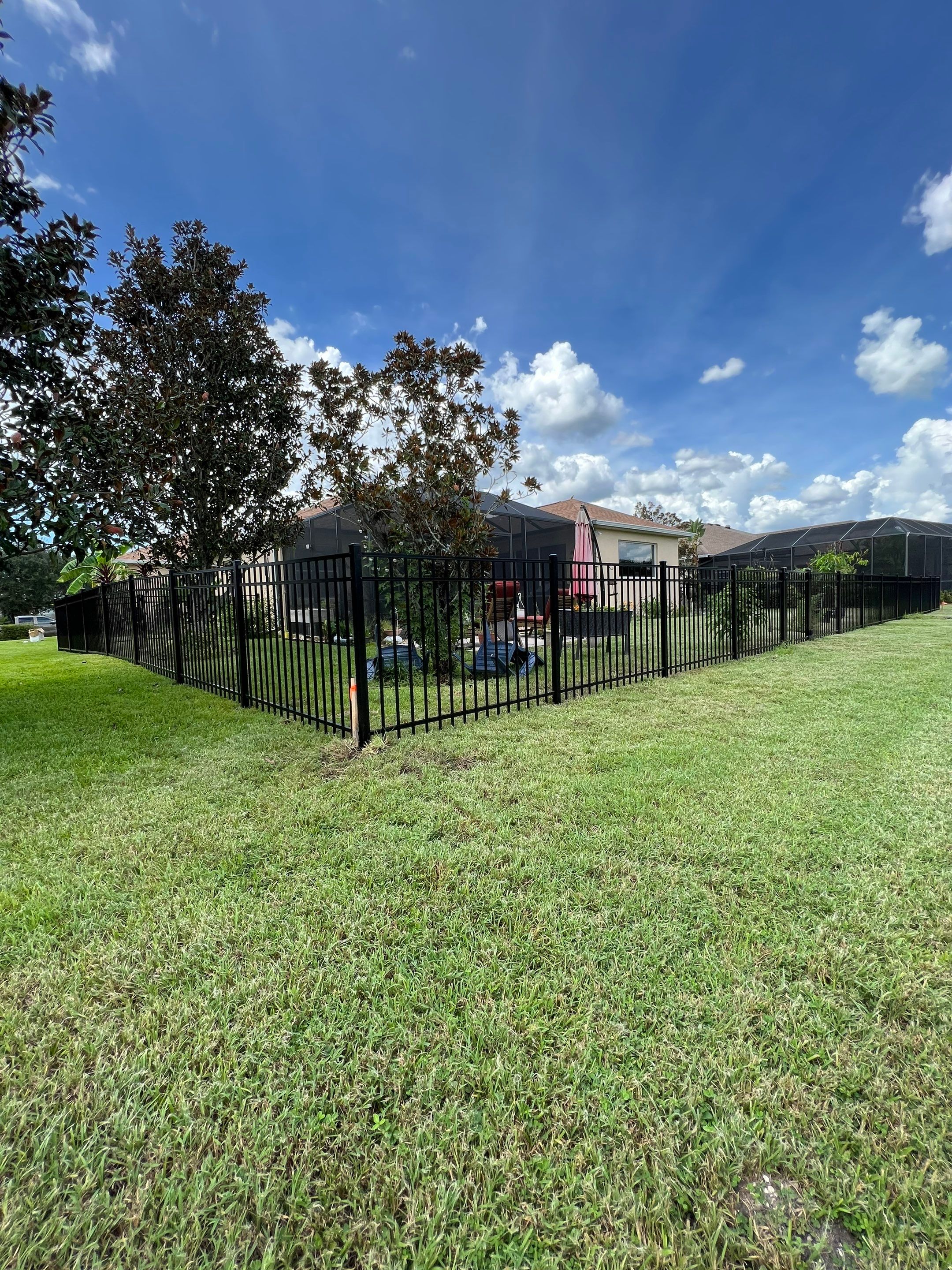 Black Aluminum Fence Installation in Bradenton, FL by Asap fence and gates, LLC