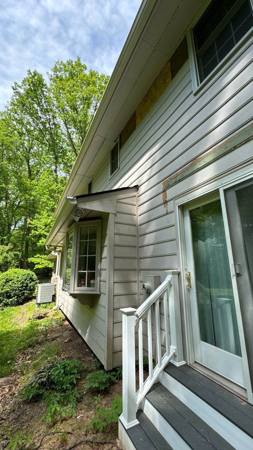 Great Falls: Siding Replacement with James Hardie Statement Beaded Plank in Cobblestone by RM Banning, Inc.