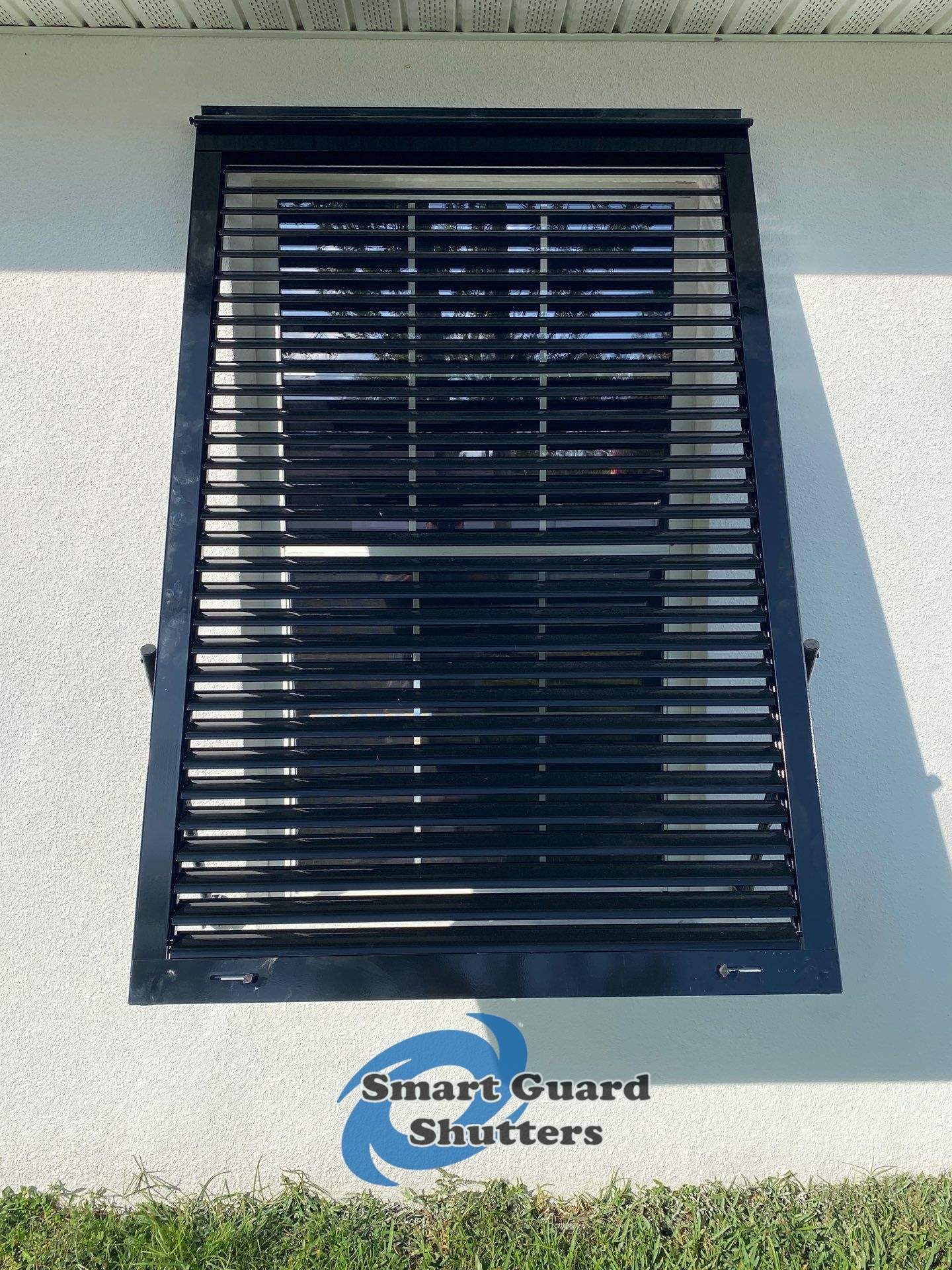 Impact Bahamas in Jet Black by Smart Guard Shutters