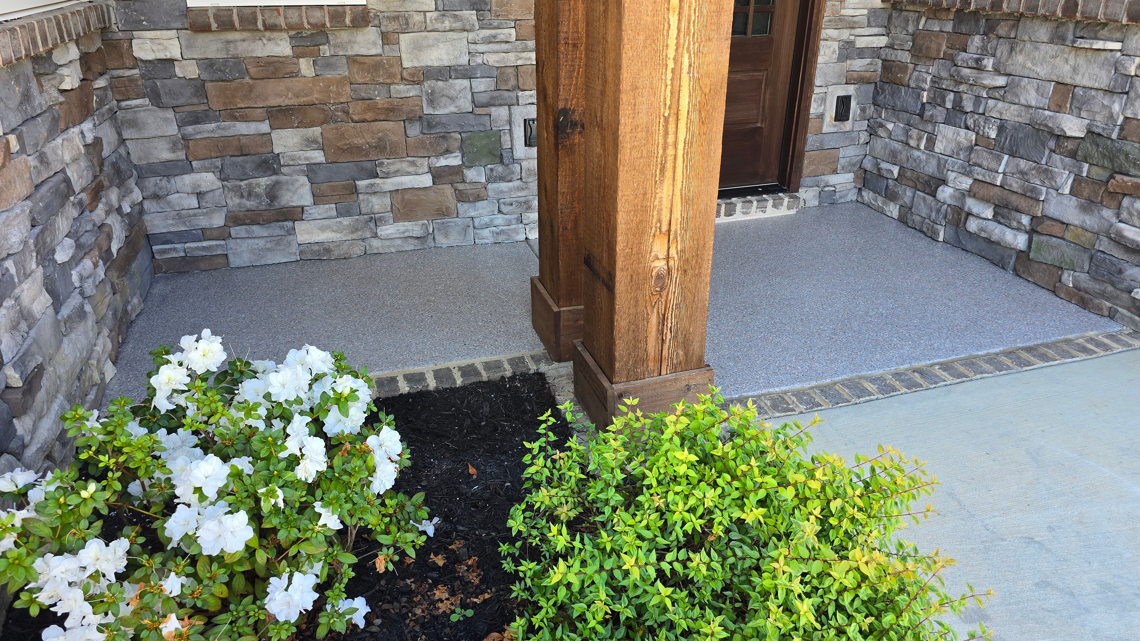 Porch & Patio Completed Using Obsidian & Pumice by Elite Floor Solutions