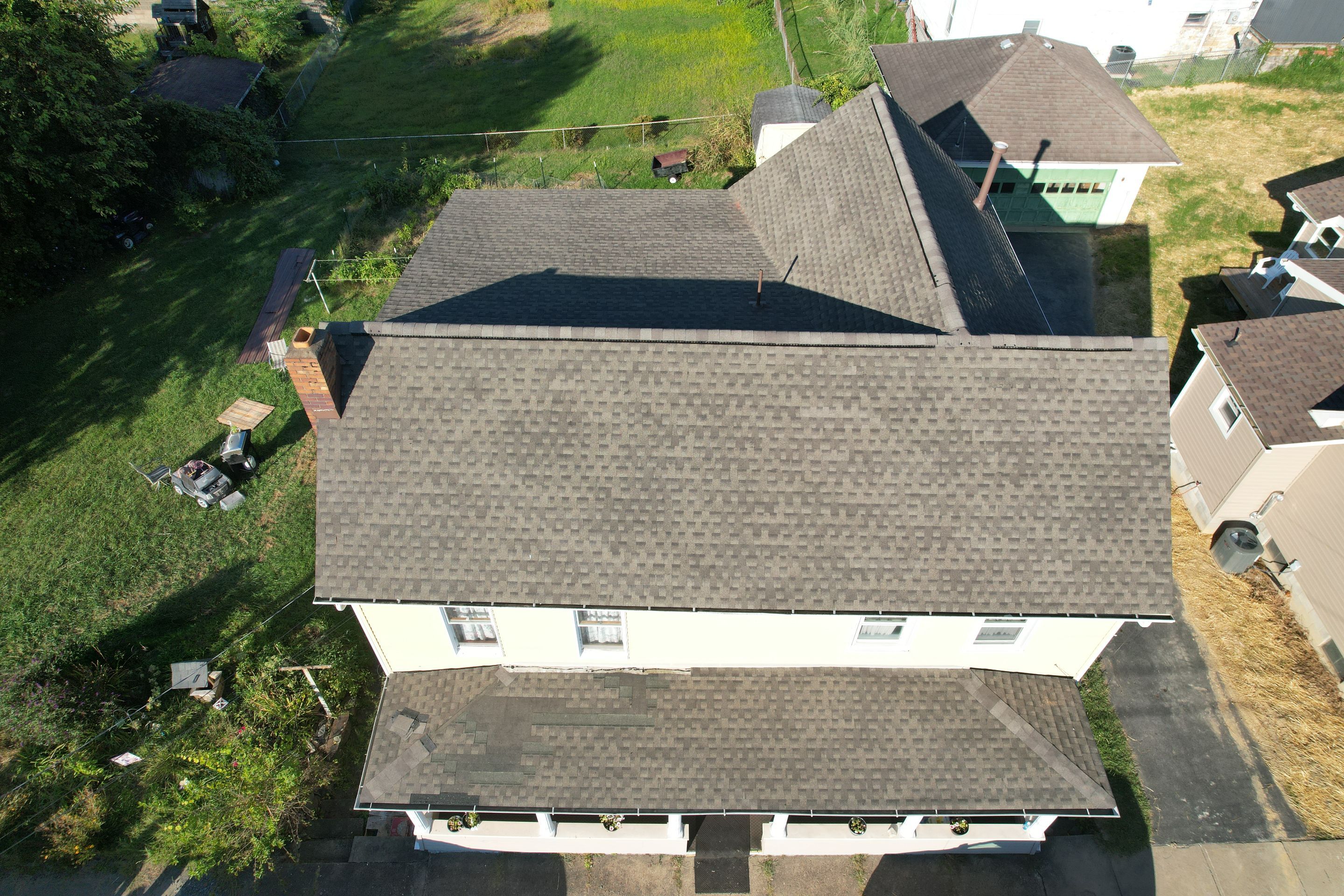 Residential Roofing Installation using GAF Timberline HDZ Weatherer Wood by Rainstoppers Roofing