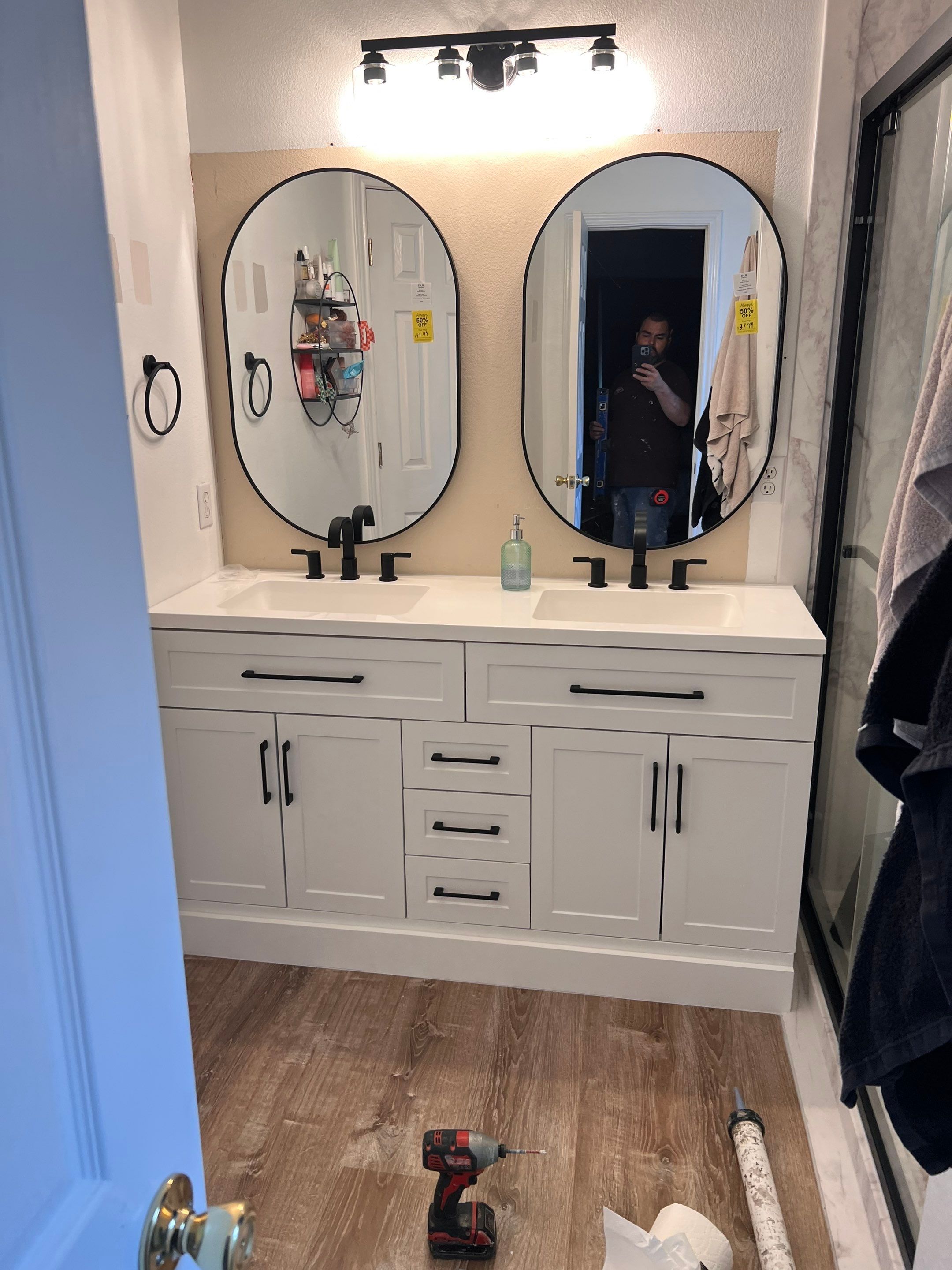 Two bathroom remodel in Buda by Lane Lauritsen - The Hill Country, Texas