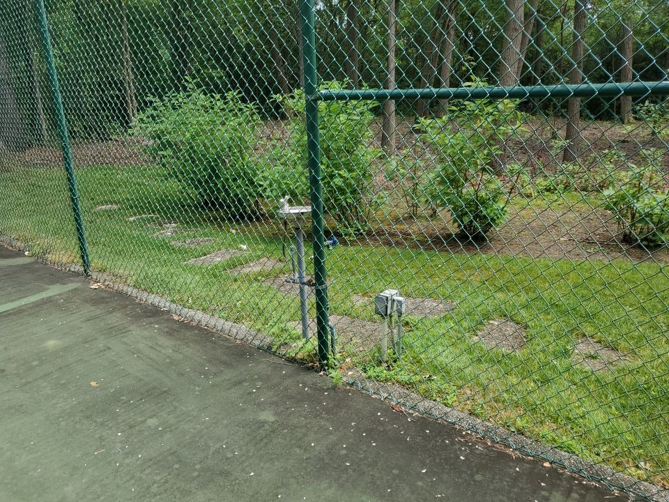 Tennis court cleaning by Northern Power Washing LLC.