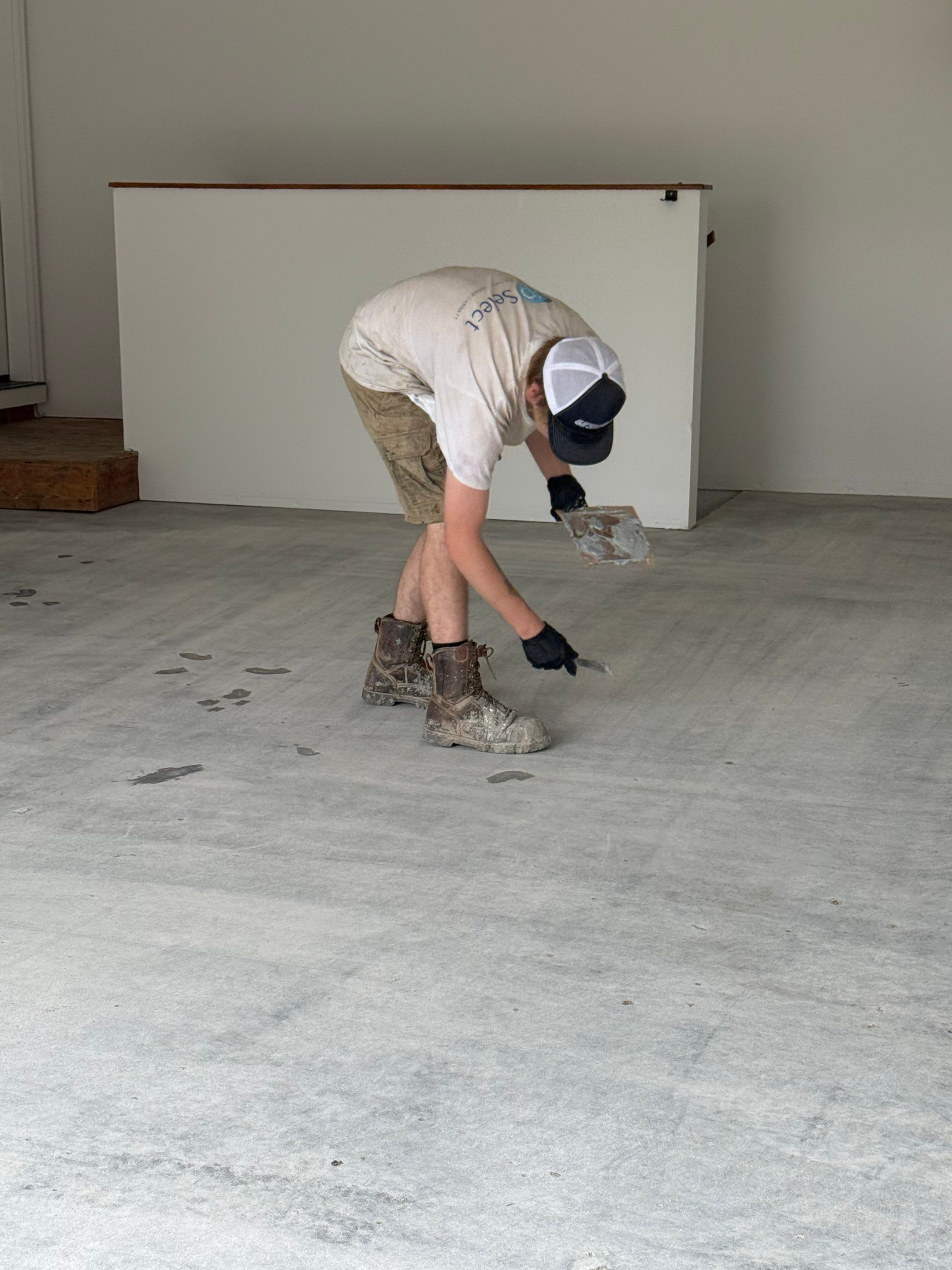 Full Garage Floor and Basement Stair Epoxy Coating in Sioux Falls by Select Painting, Coatings & Garage Cabinets