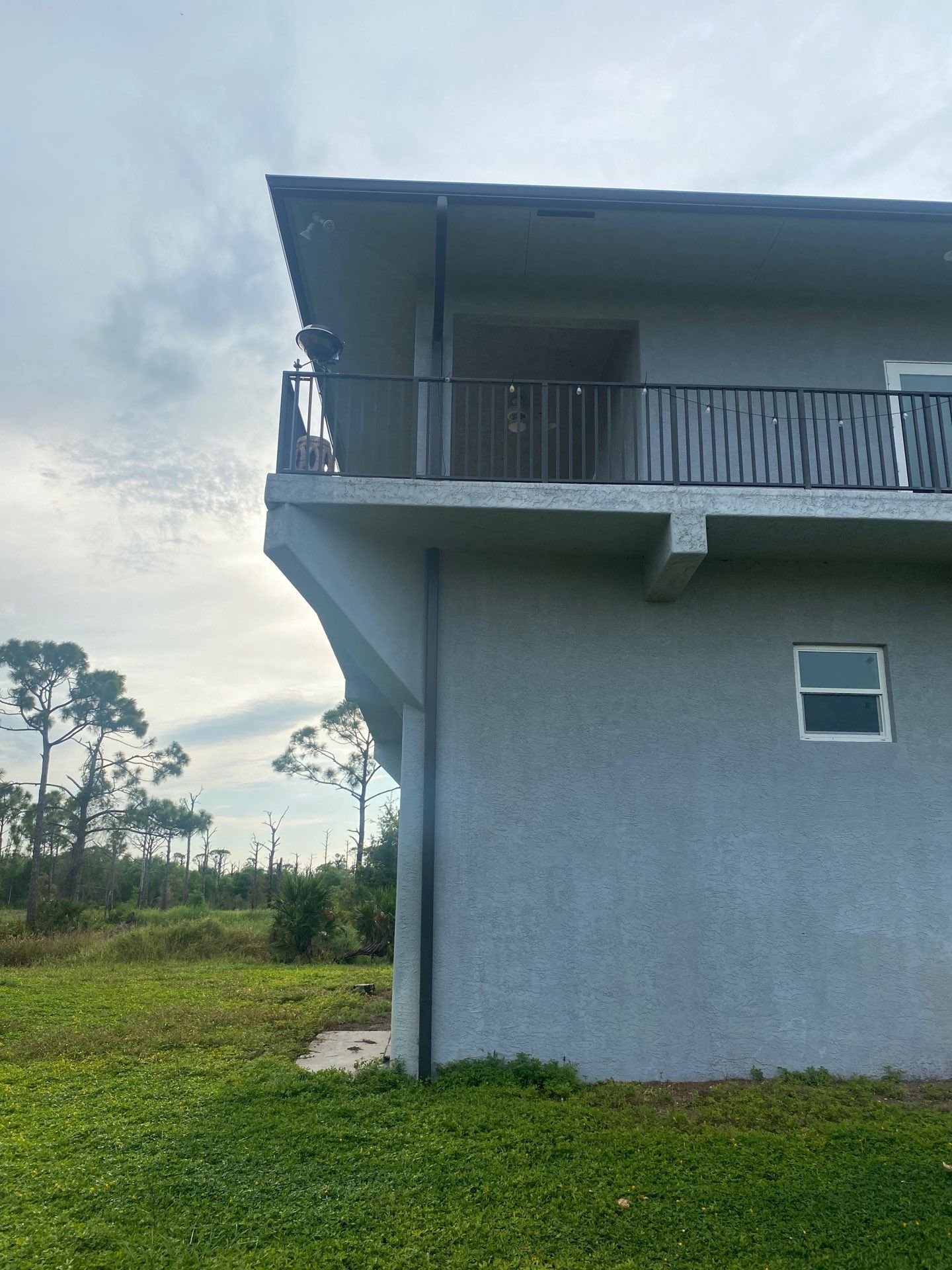 Black Seamless Gutters St. James City by Gutter Professors