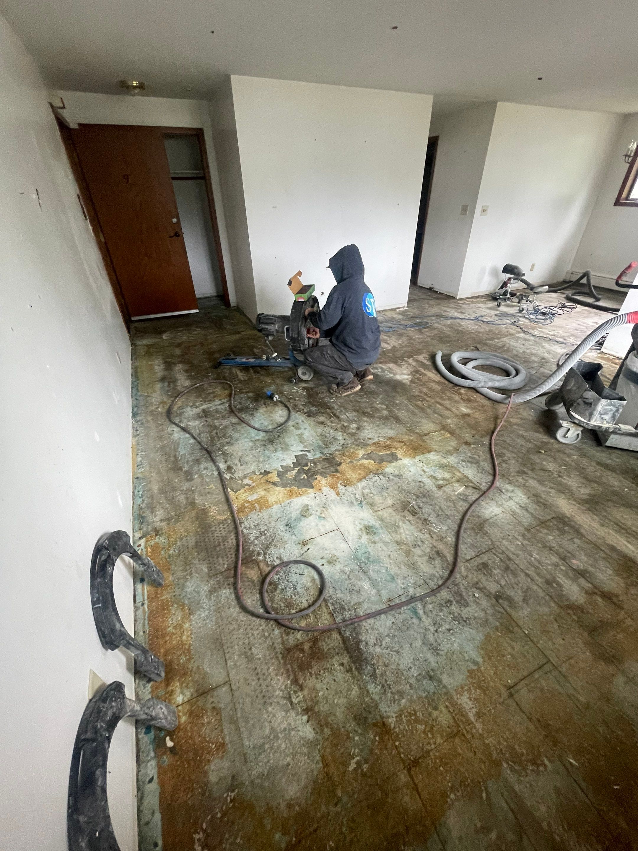 Commercial Subfloor Preparation and Flooring Restoration in Sioux Falls by Select Painting, Coatings & Garage Cabinets