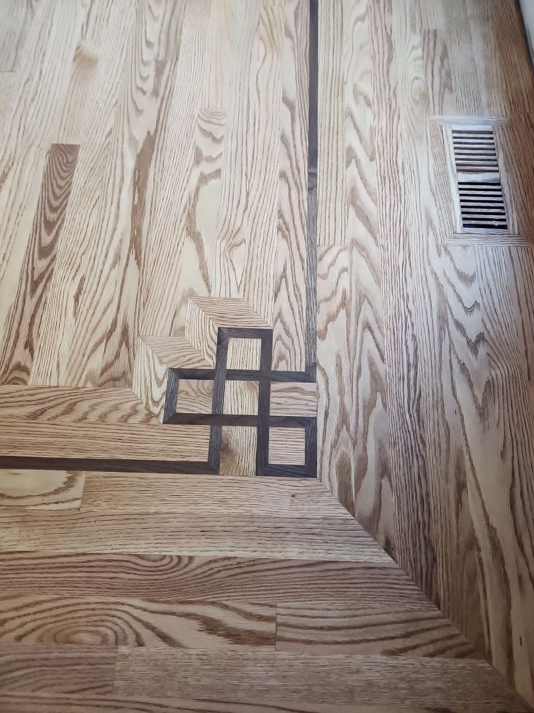 Ann Arbor Elegance: Red Oak and Walnut Living Room Masterpiece by Ann Arbor Hardwoods