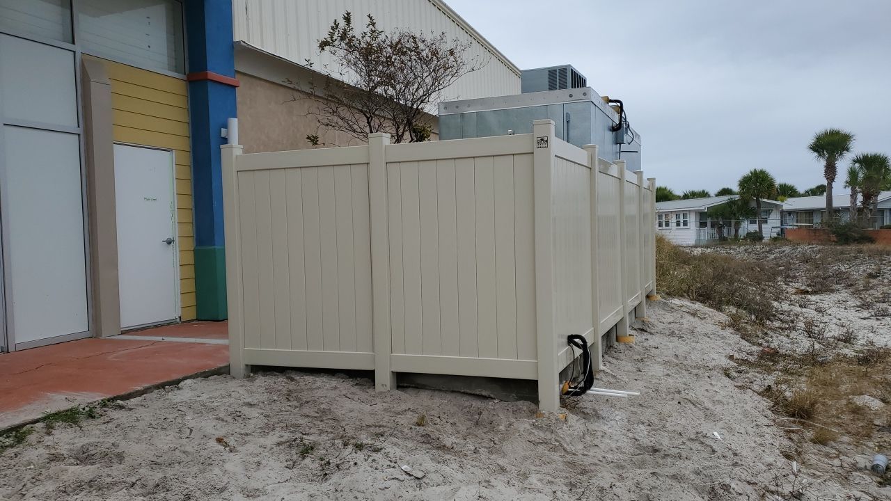 Commercial using Tan 6' Vinyl by Hip Square Fence Inc.