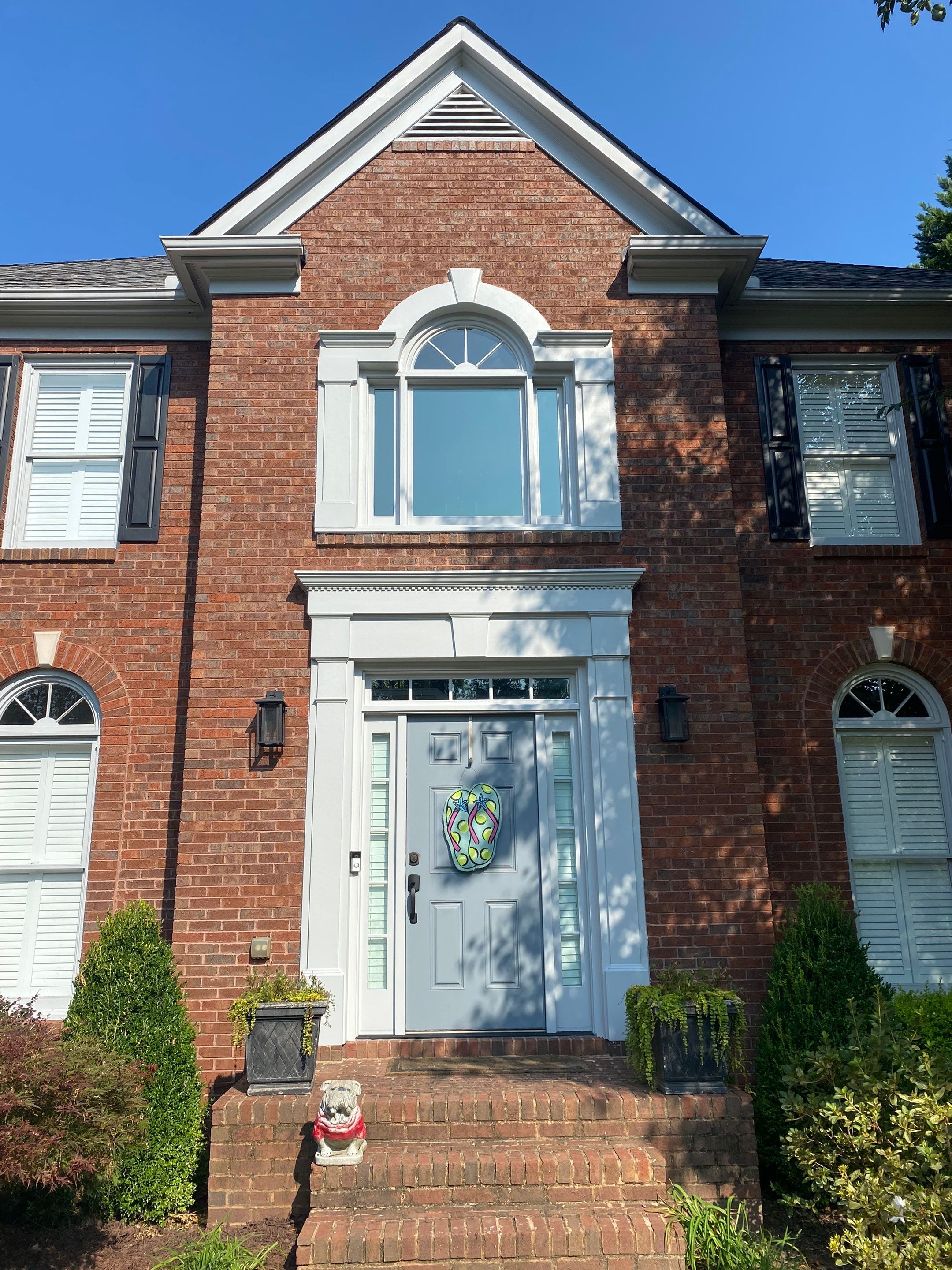 Exterior Painting and Trim Refresh for a Woodstock Brick Home by Swift Home Renovations