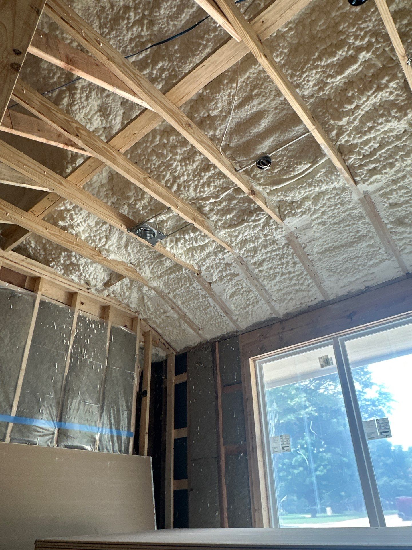 Open cell spray foam & rockwool job completed in Dallas TX by Apex Insulation Solutions