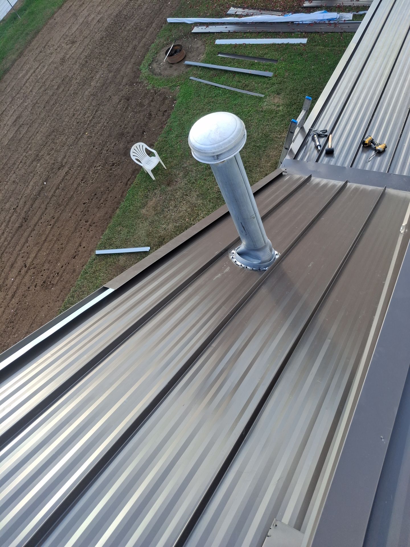 Residential Roofing Installation using Standing Seam Metal - 4766 by Rainstoppers Roofing