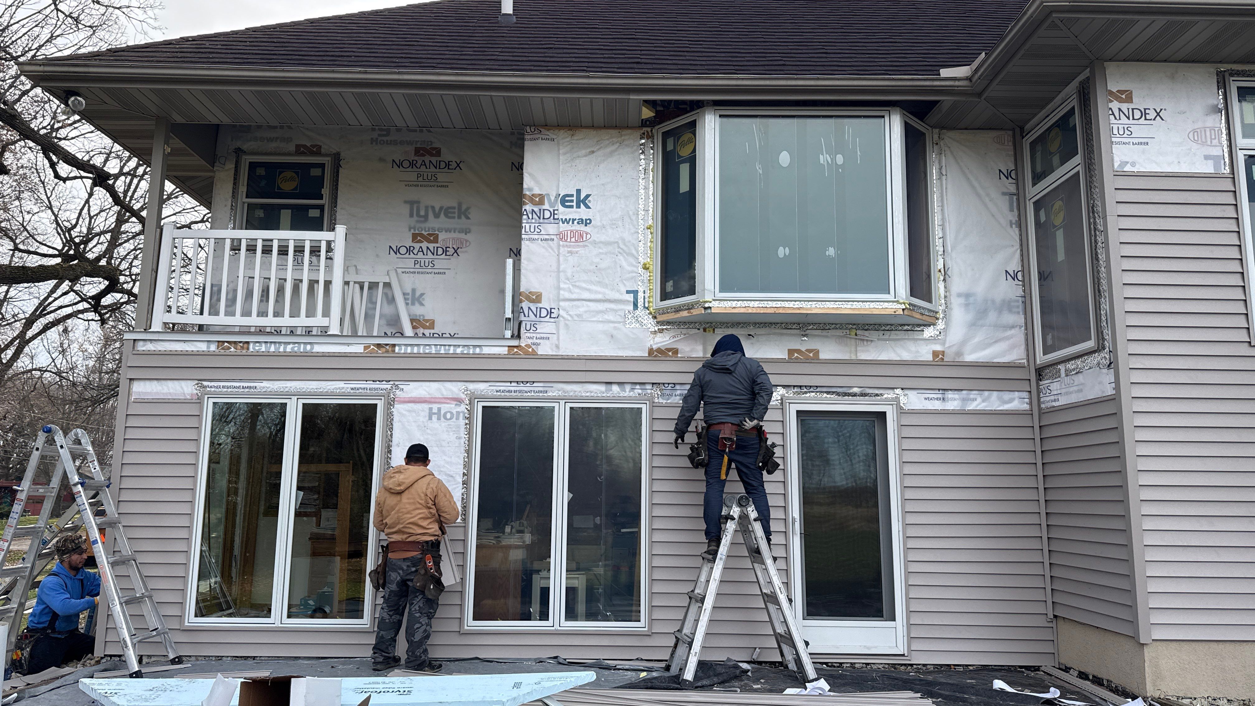 A Clean Window Upgrade Ready for New Siding with Pella Lifestyle Series by United Windows and Siding LLC