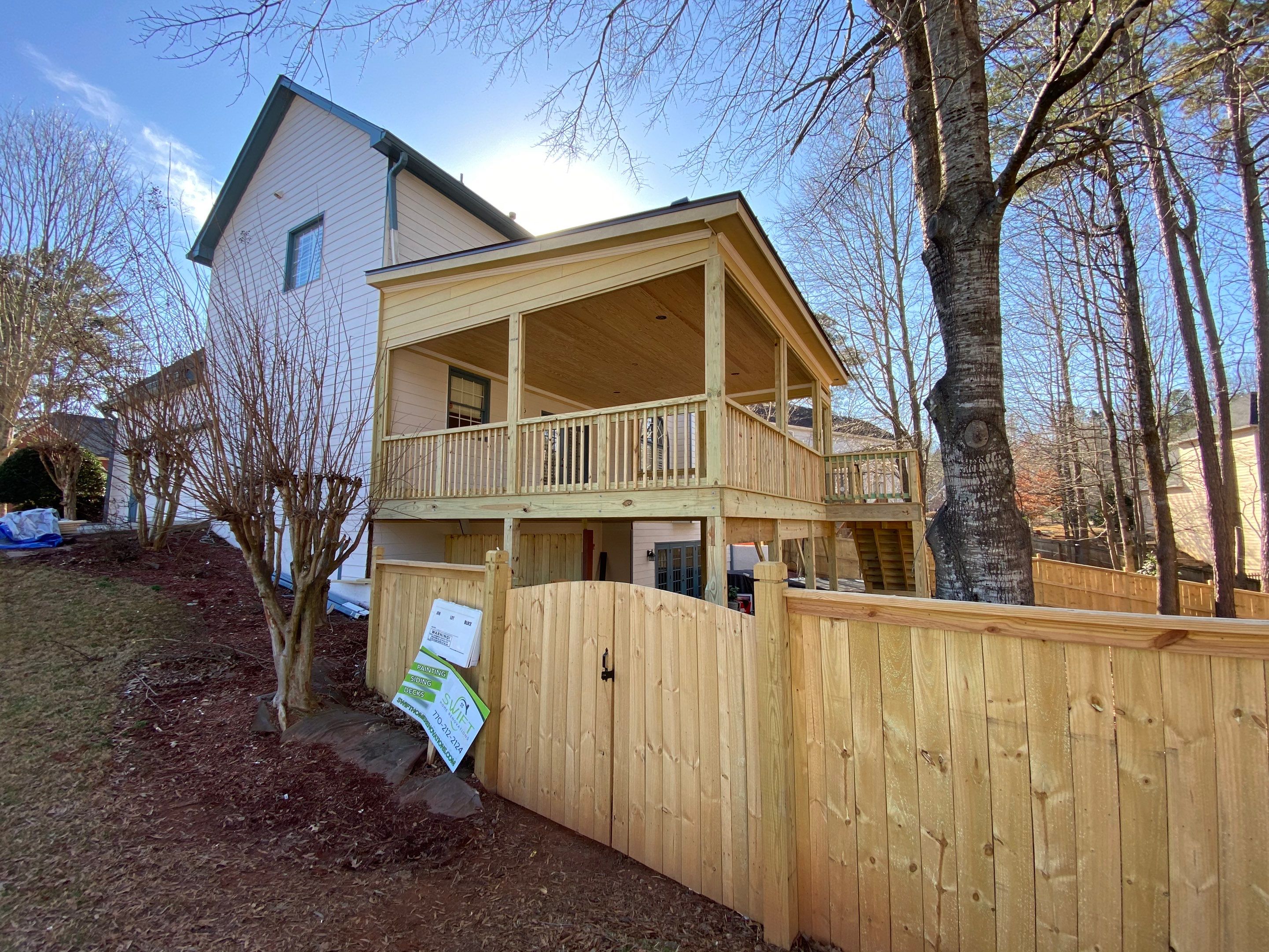 Covered Porch Addition and Custom Privacy Fence Installation in Alpharetta by Swift Home Renovations
