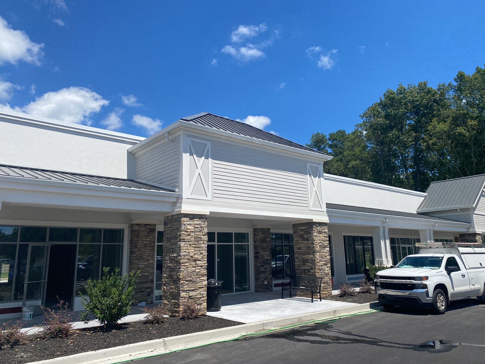 Commercial Roofing Installation using Berridge 11 1/2" Cee Lock .032 Aluminum Charcoal Grey by Infinity Metal Systems