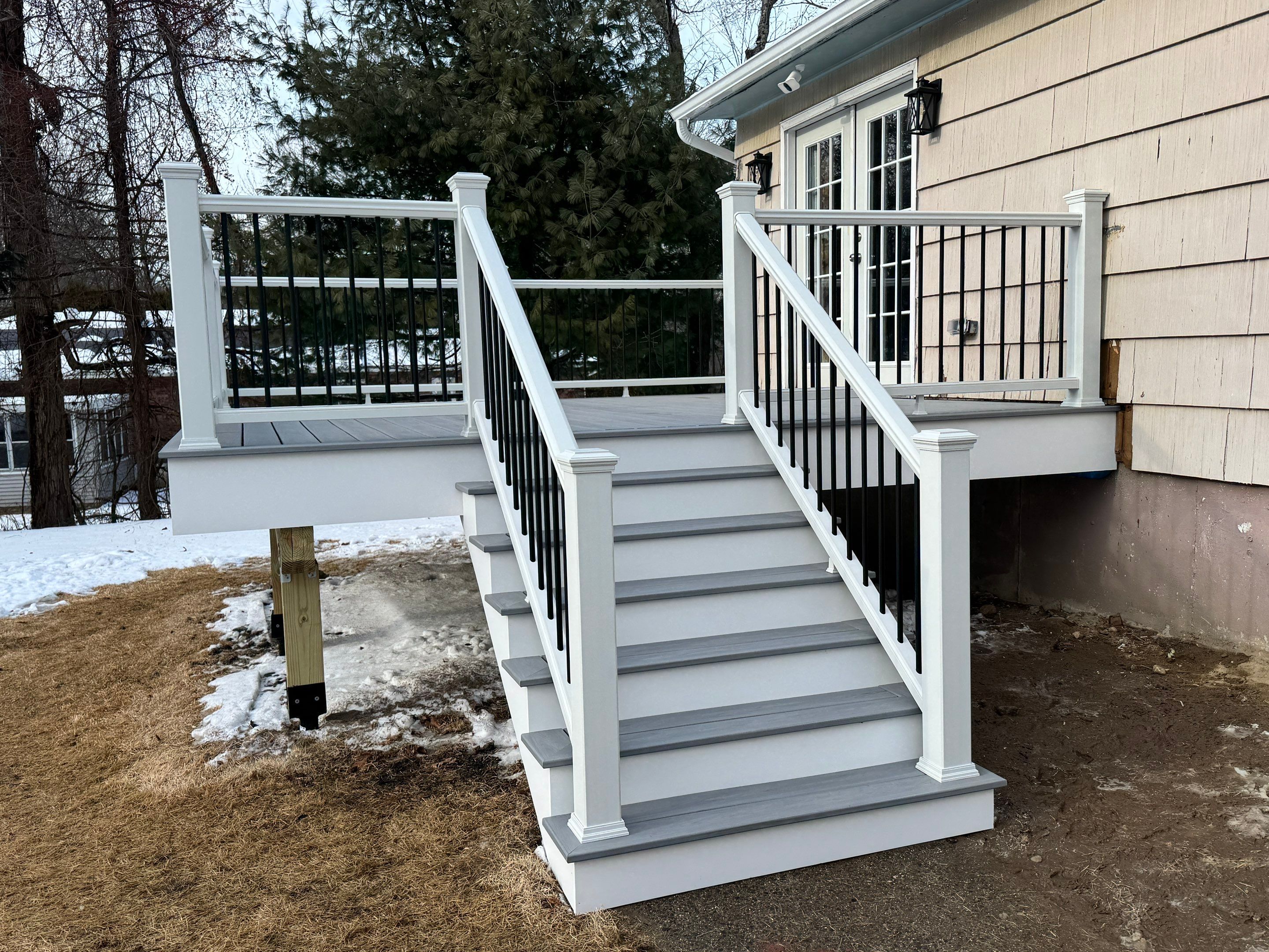 Deck replacement using Trex Lineage Rainier , and Transcend White railing.  by DiGiorgi Roofing and Siding Inc