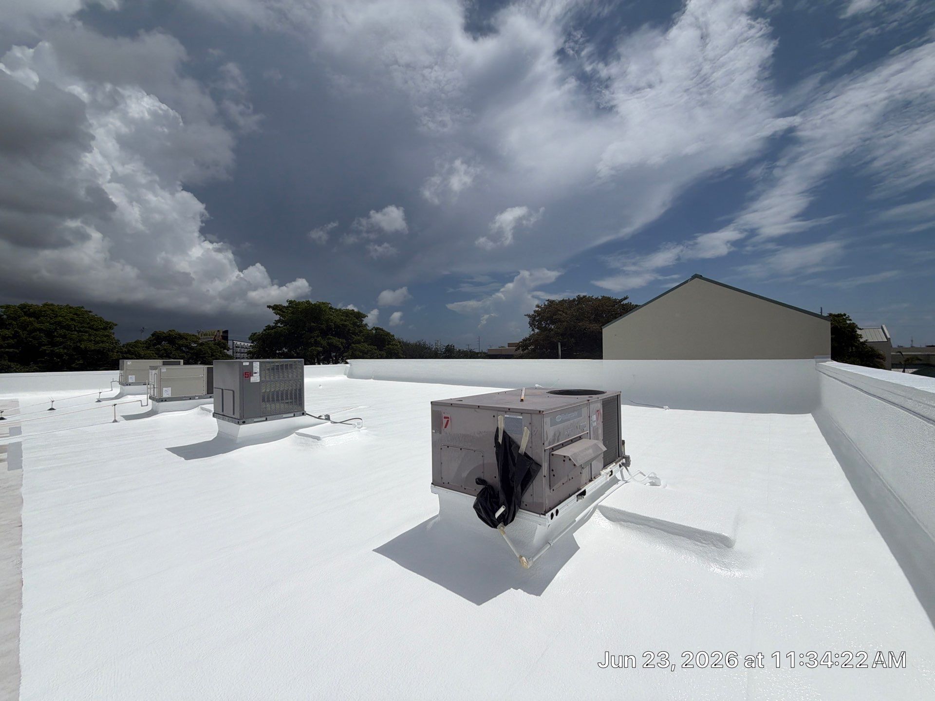 Commercial Flat Roof Restoration and Elastomeric Waterproofing in Delray Beach by Roof King LLC