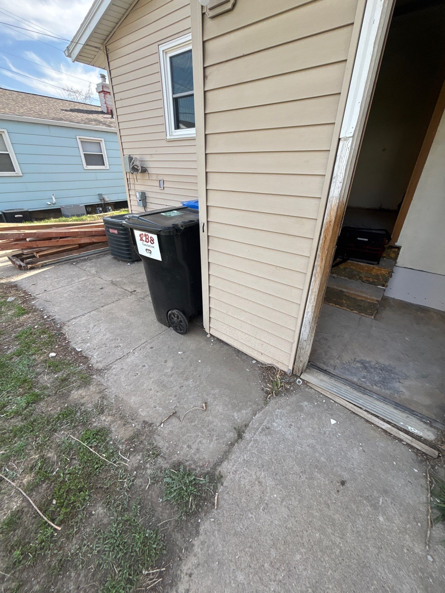 Comprehensive Basement Concrete Floor Coating and Crack Repair in Sioux Falls by Select Painting, Coatings & Garage Cabinets