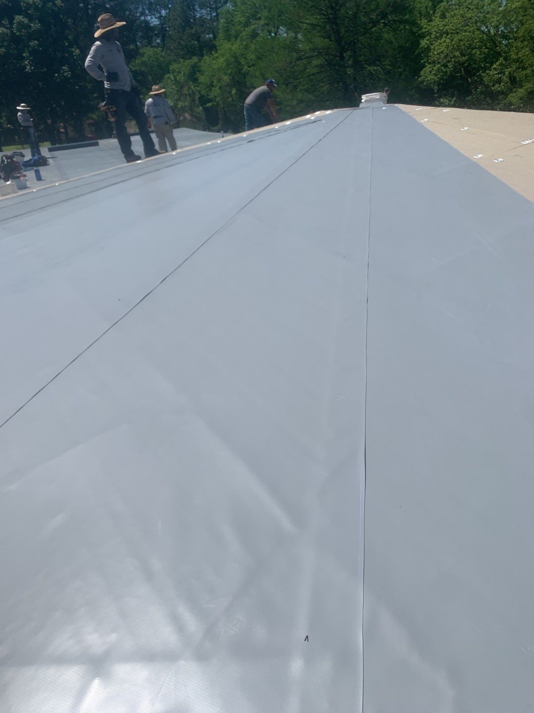 Commercial Roofing Installation using 50 mil PVC by Hostetler Roofing