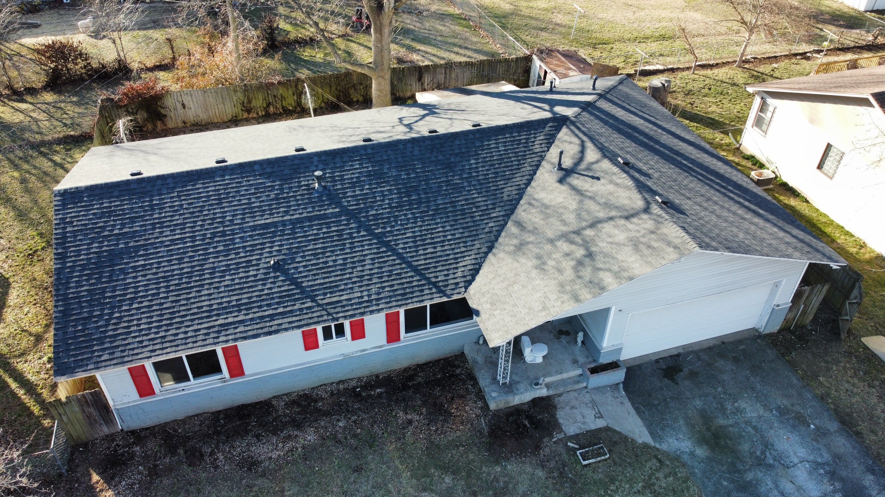 Residential Roof + Gutters & Downspouts Install  by Titan Commercial & Residential Roofing 