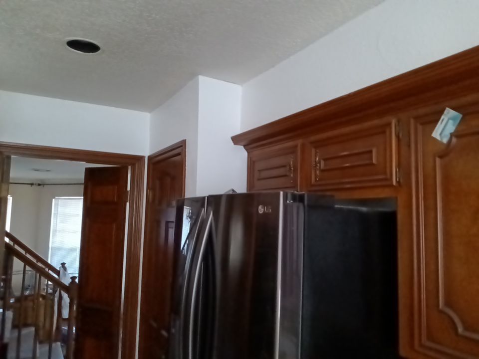 Interior and exterior painting project by Roof Concepts Construction