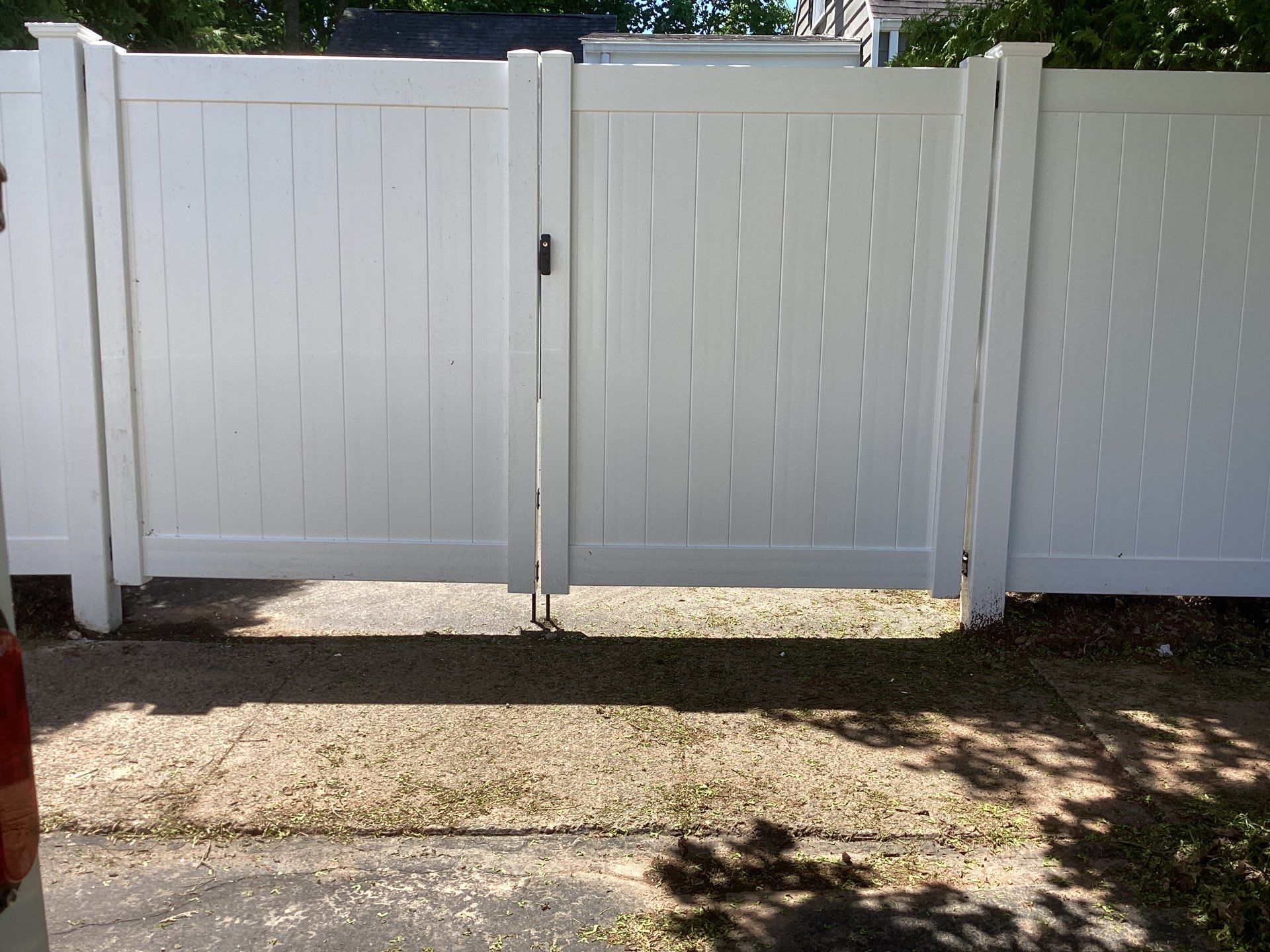 Fence replacement with White Vinyl privacy fence and matching gates  by DiGiorgi Roofing and Siding Inc