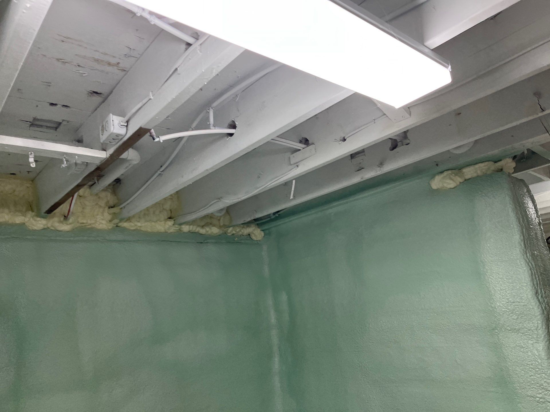 Basement Exterior Walls using Closed Cell Spray Foam by NYS Foam & Energy
