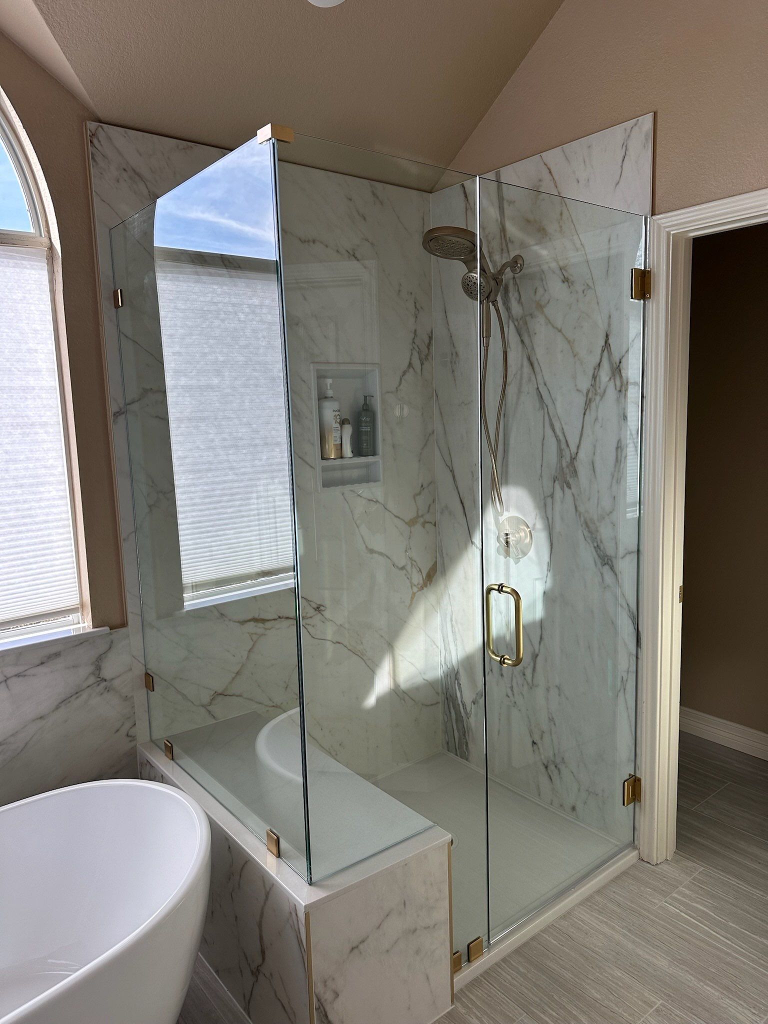 Stone Oak Bathroom Remodel with Freestanding Tub & Walk-In Shower by Legacy Bath and Kitchen