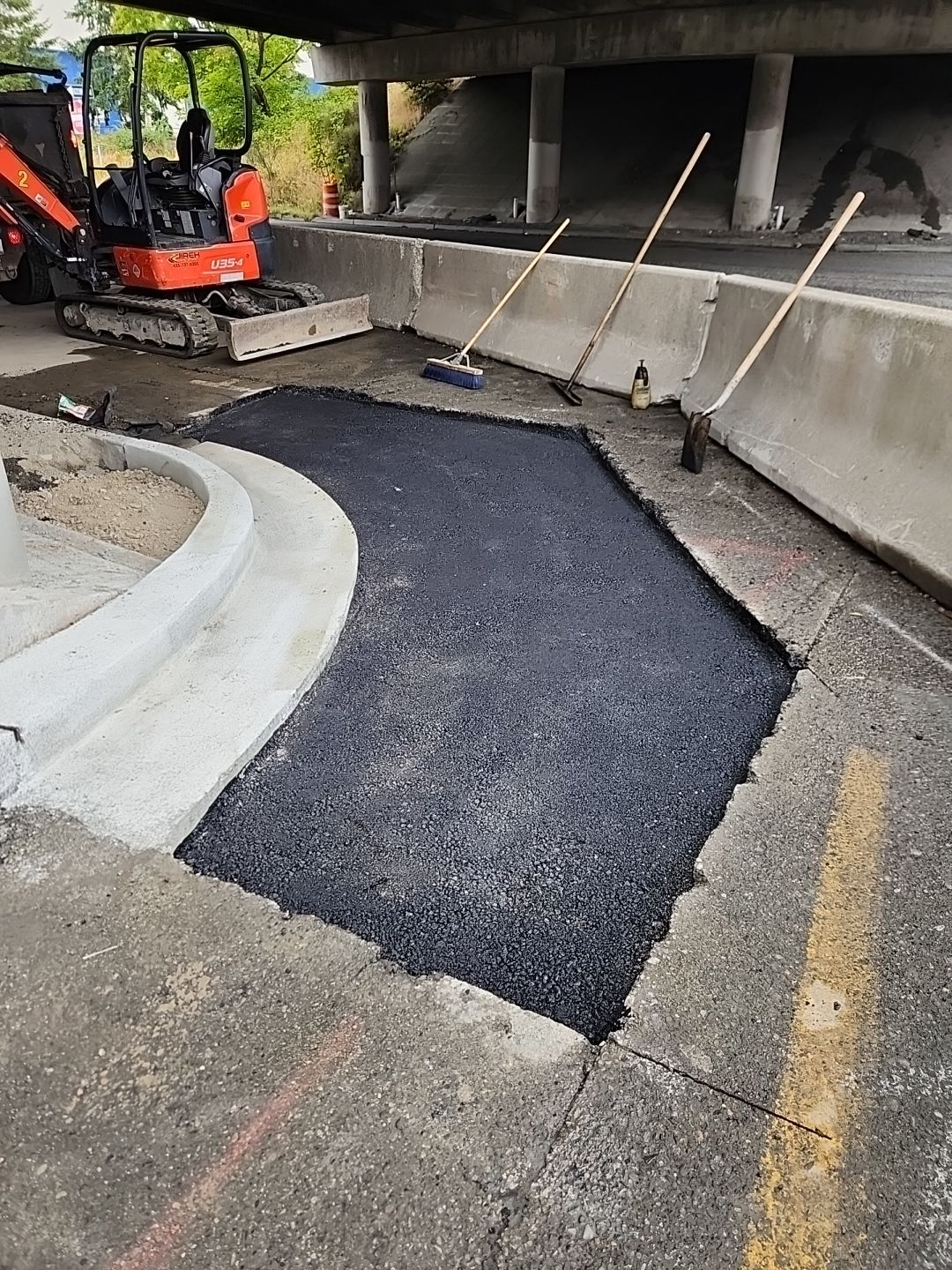 Kraemer North America | Airport Road Repair by Jireh Asphalt & Concrete Inc 