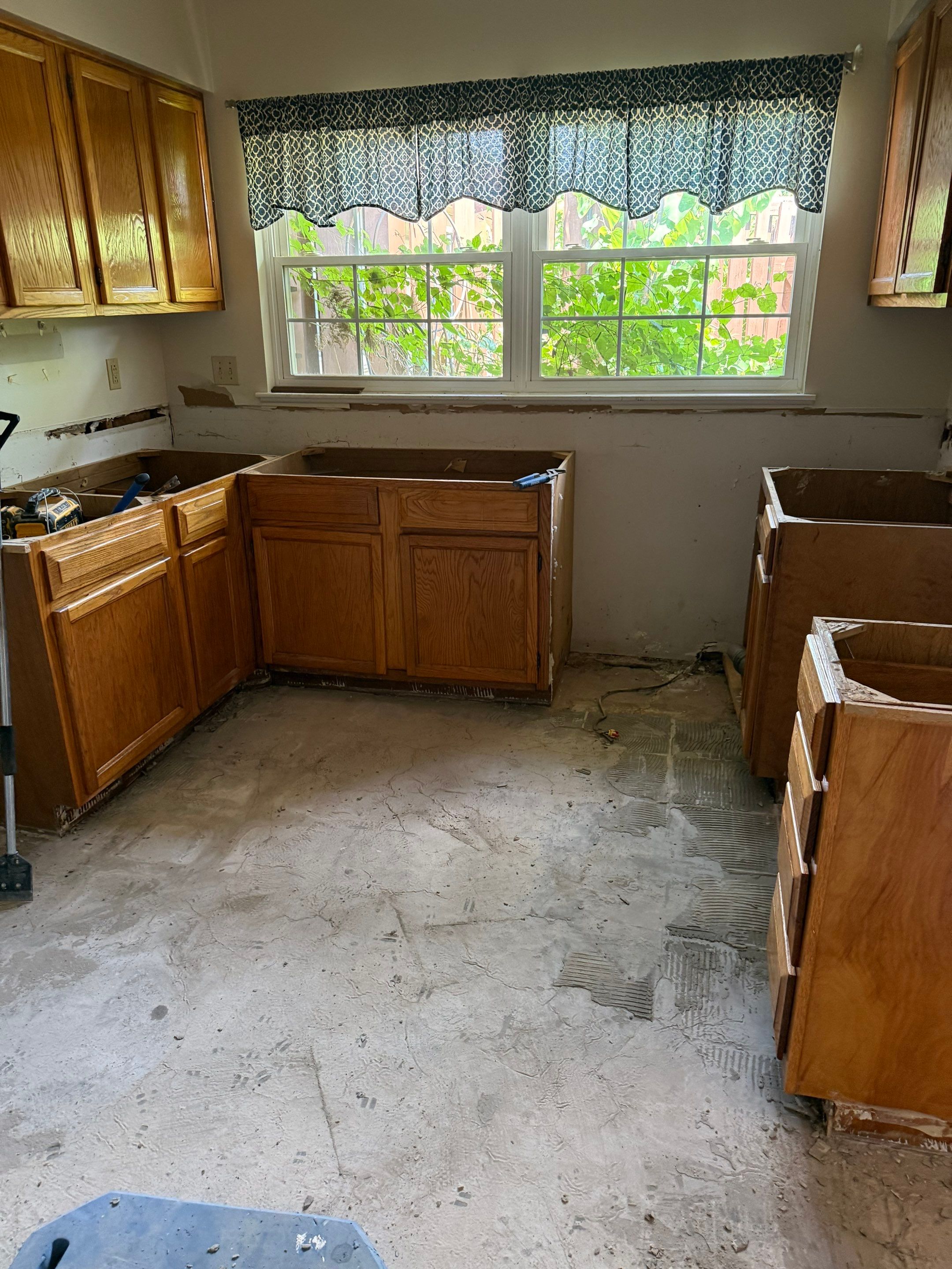 Complete Home Remodel Featuring Custom Kitchen and Wood-Look Plank Flooring by MAJO