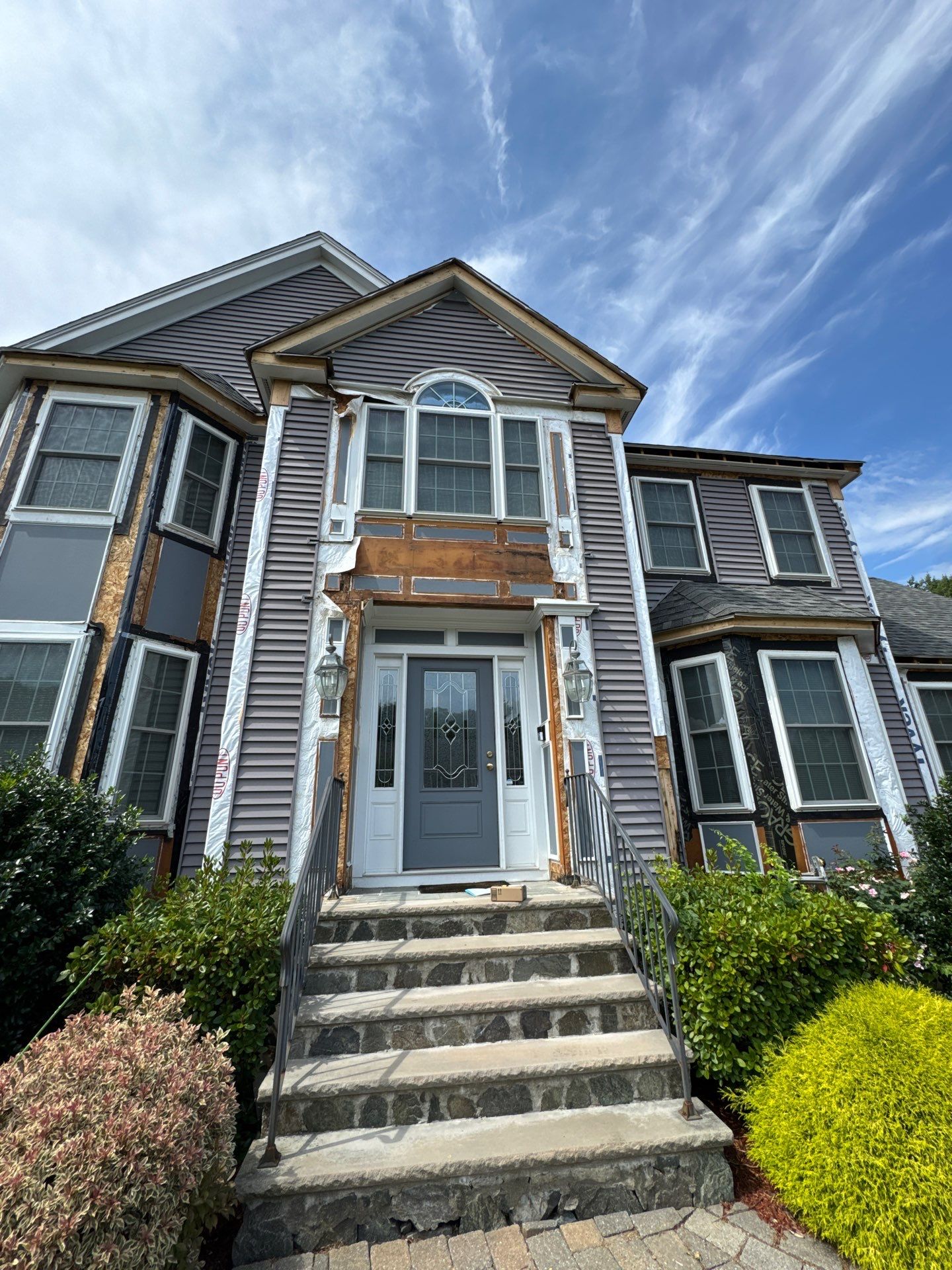 Roof, Trim, Deck, and Gutter Restoration by Mighty Dog Roofing of Greater Middlesex County