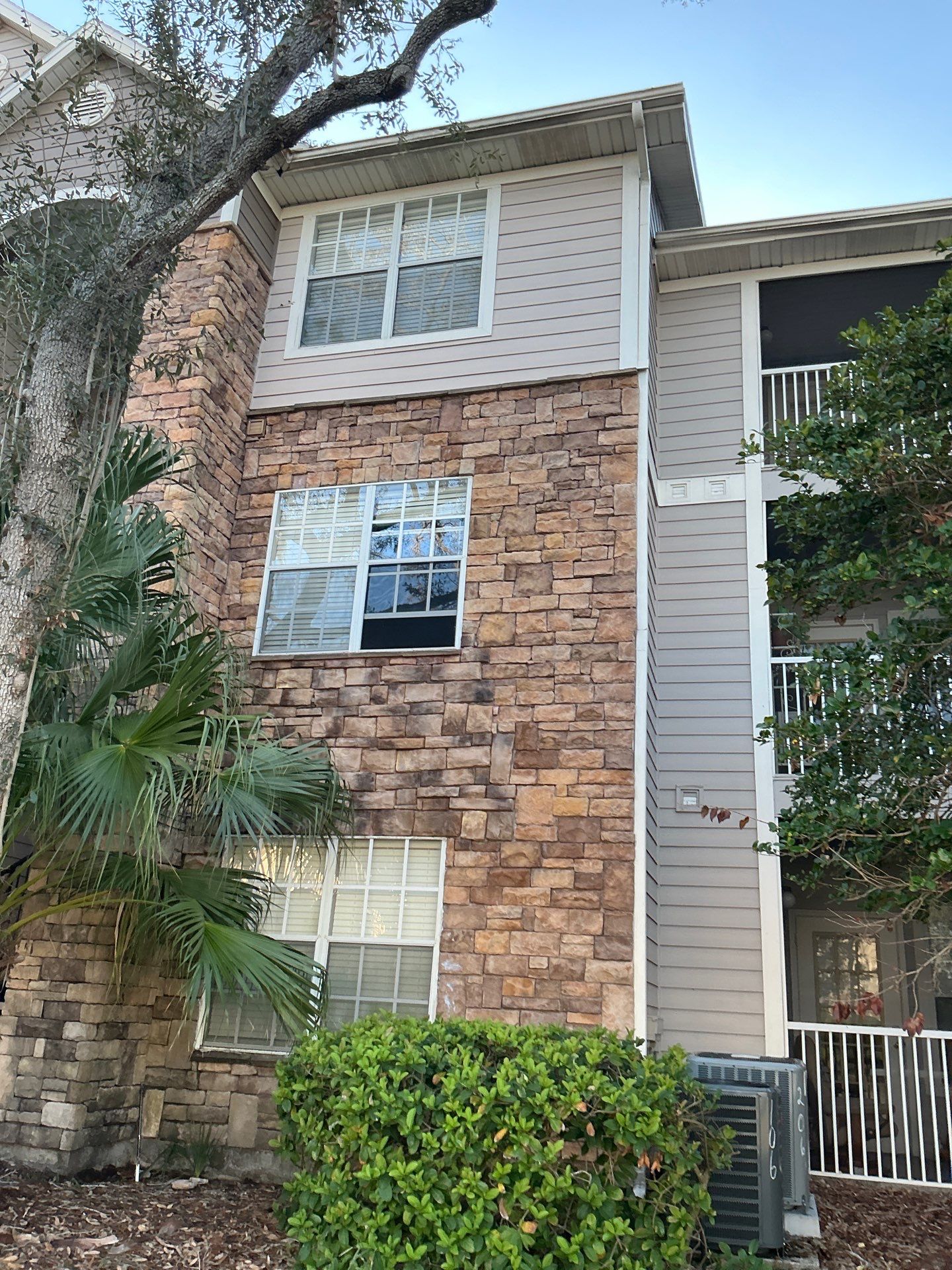 Downspouts for the High Buildings in Tampa FL by Gutter Professors
