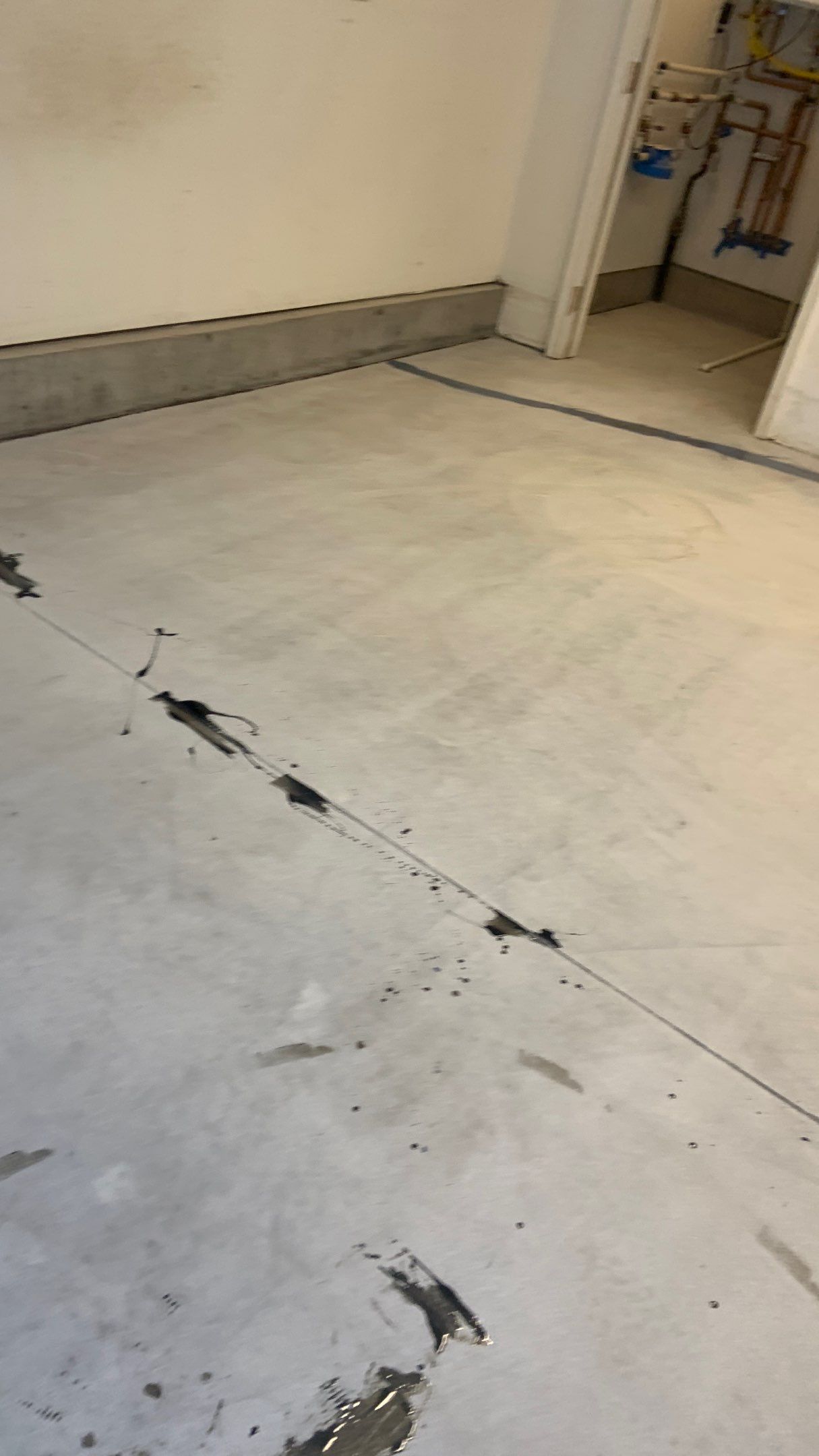 Garage Transformation using Pebble Beach by Croc Coatings, LLC