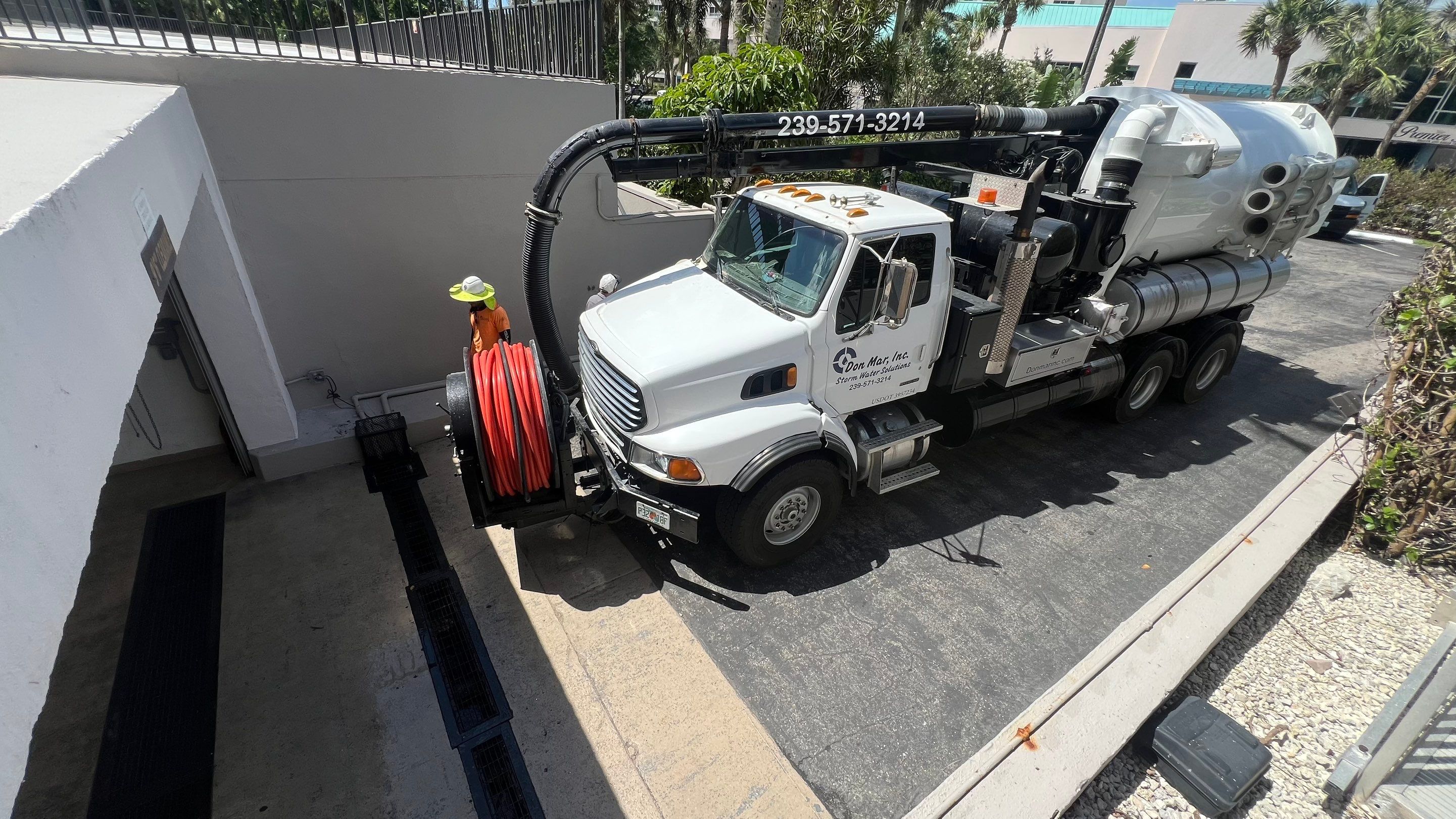 Condo Channel Drain and Sump Pit Cleaning by APS Power & Water