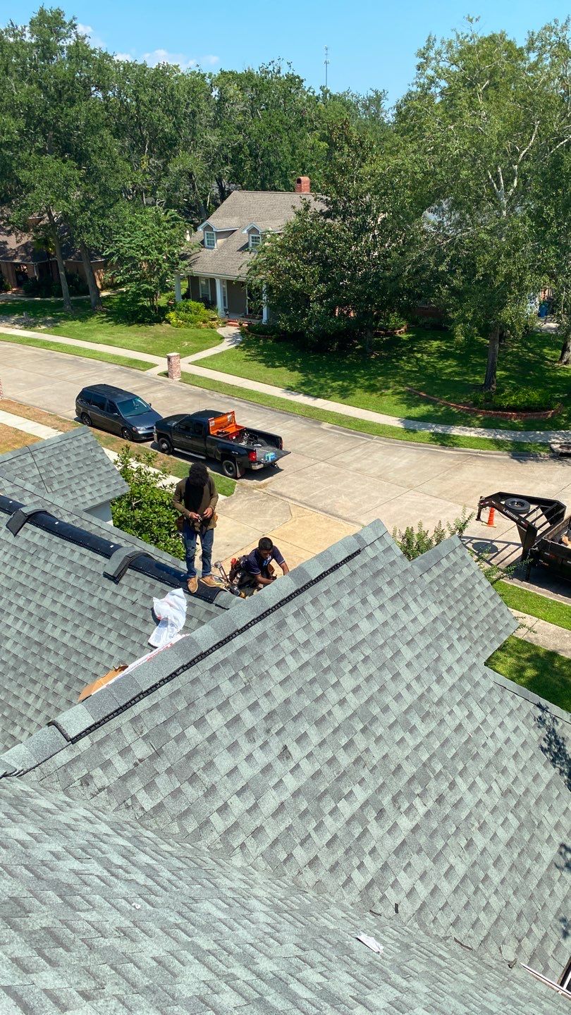 Residential Roofing Installation using Roof Replacement by American Roofing & Construction LLC