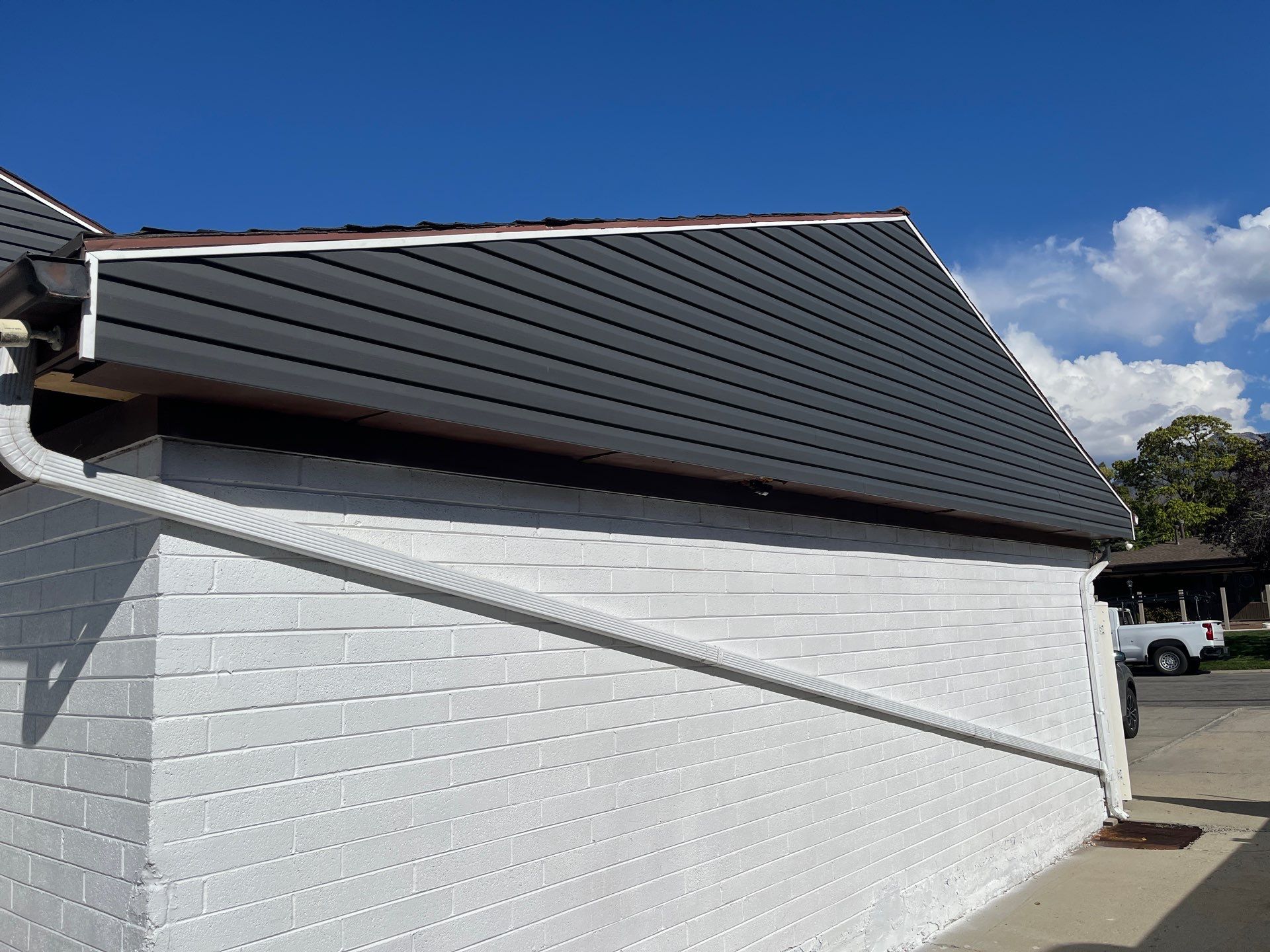 Sandy | Cedar Overlay Vinyl Installation | Nightfall & White by Ideal Siding Utah