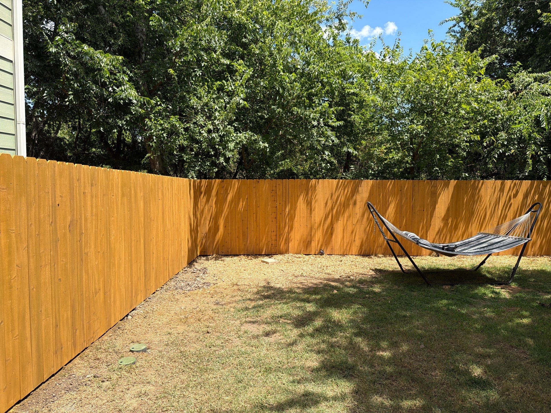 Custom Cedar Privacy Fence Replacement and Staining in Georgetown by Rhino Home Care