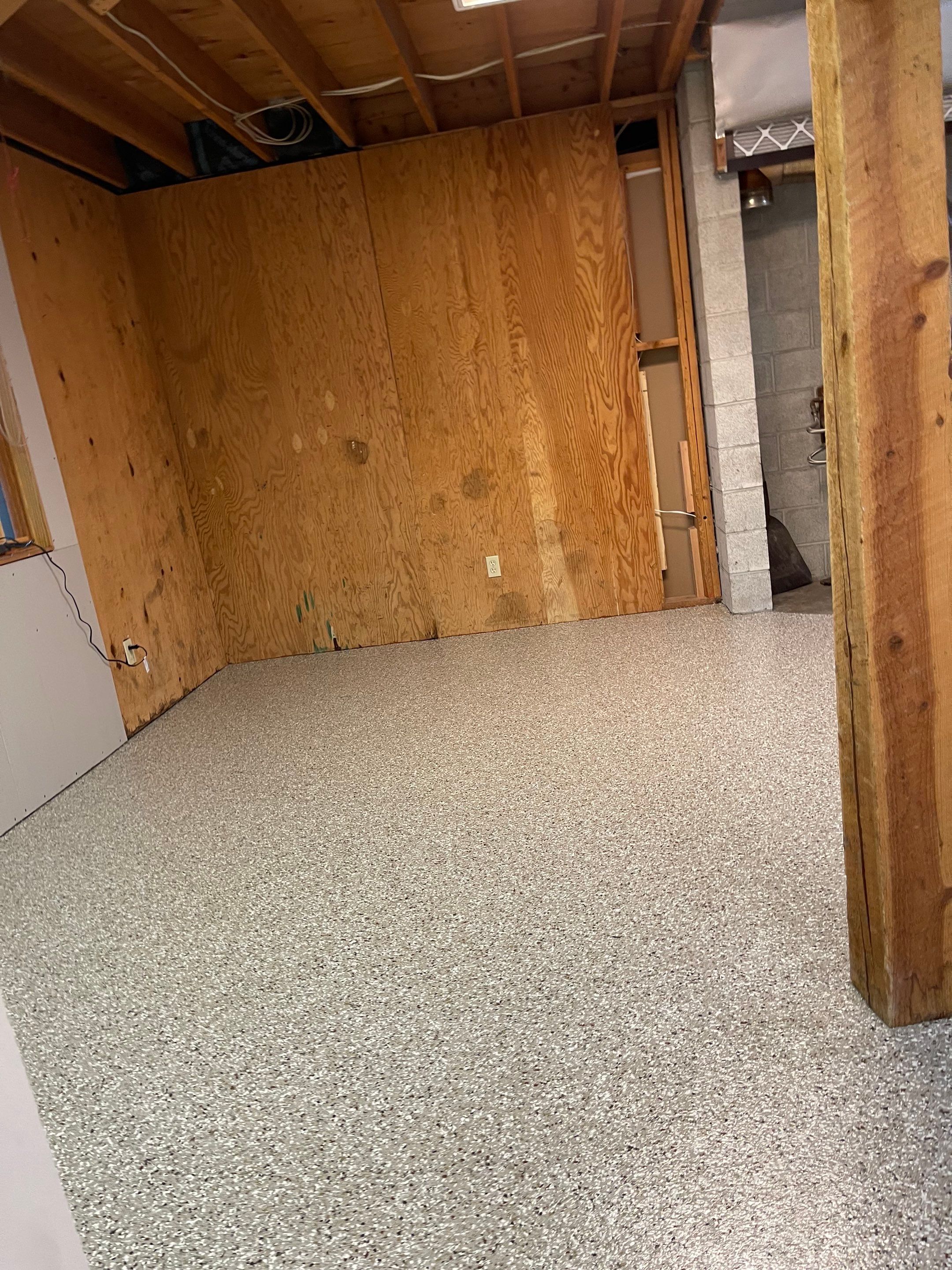 Basement Transformation using Pebble Beach by Croc Coatings, LLC
