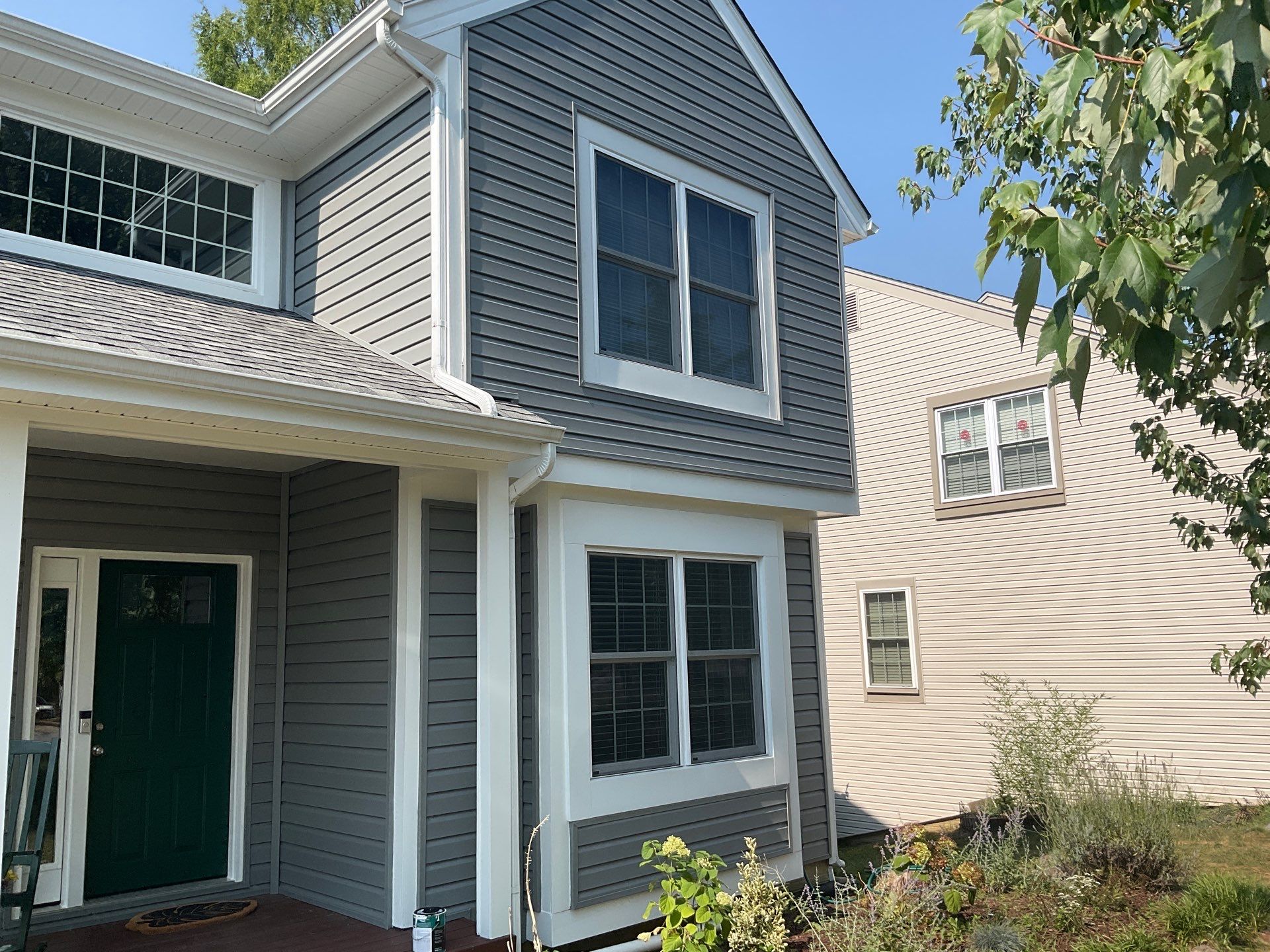 New Prodigy siding with One-piece insulated siding system & Exterior painting   by Alpha Design Services