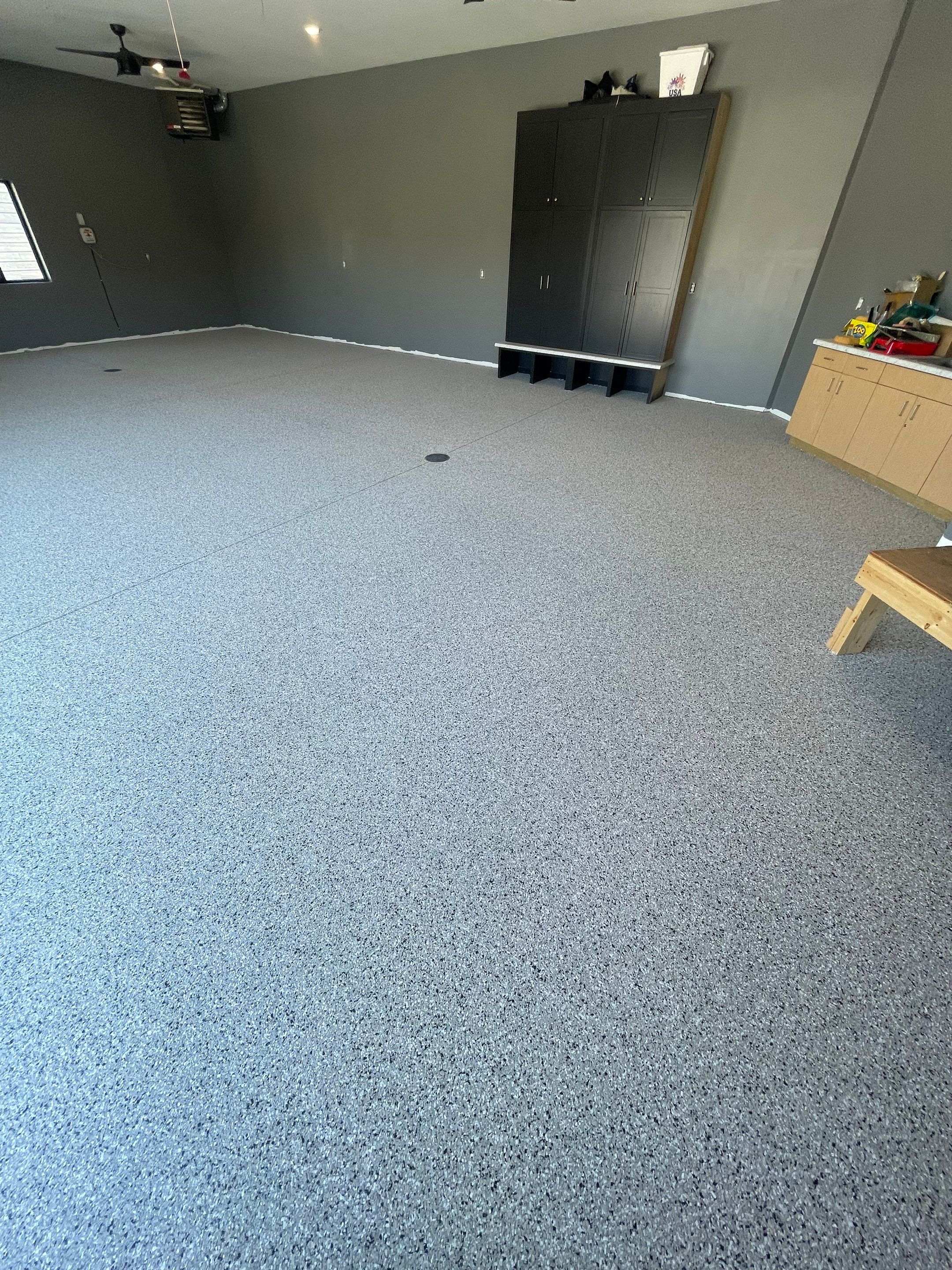 Custom Speckled Concrete Coating for Dell Rapids Garage by Select Painting, Coatings & Garage Cabinets