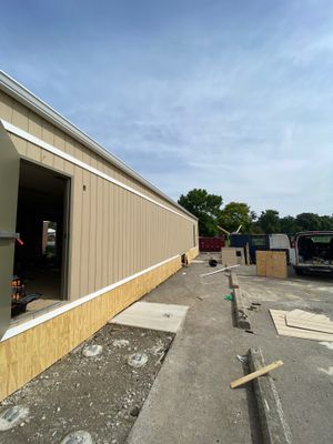 Commercial Flat Roof and Siding