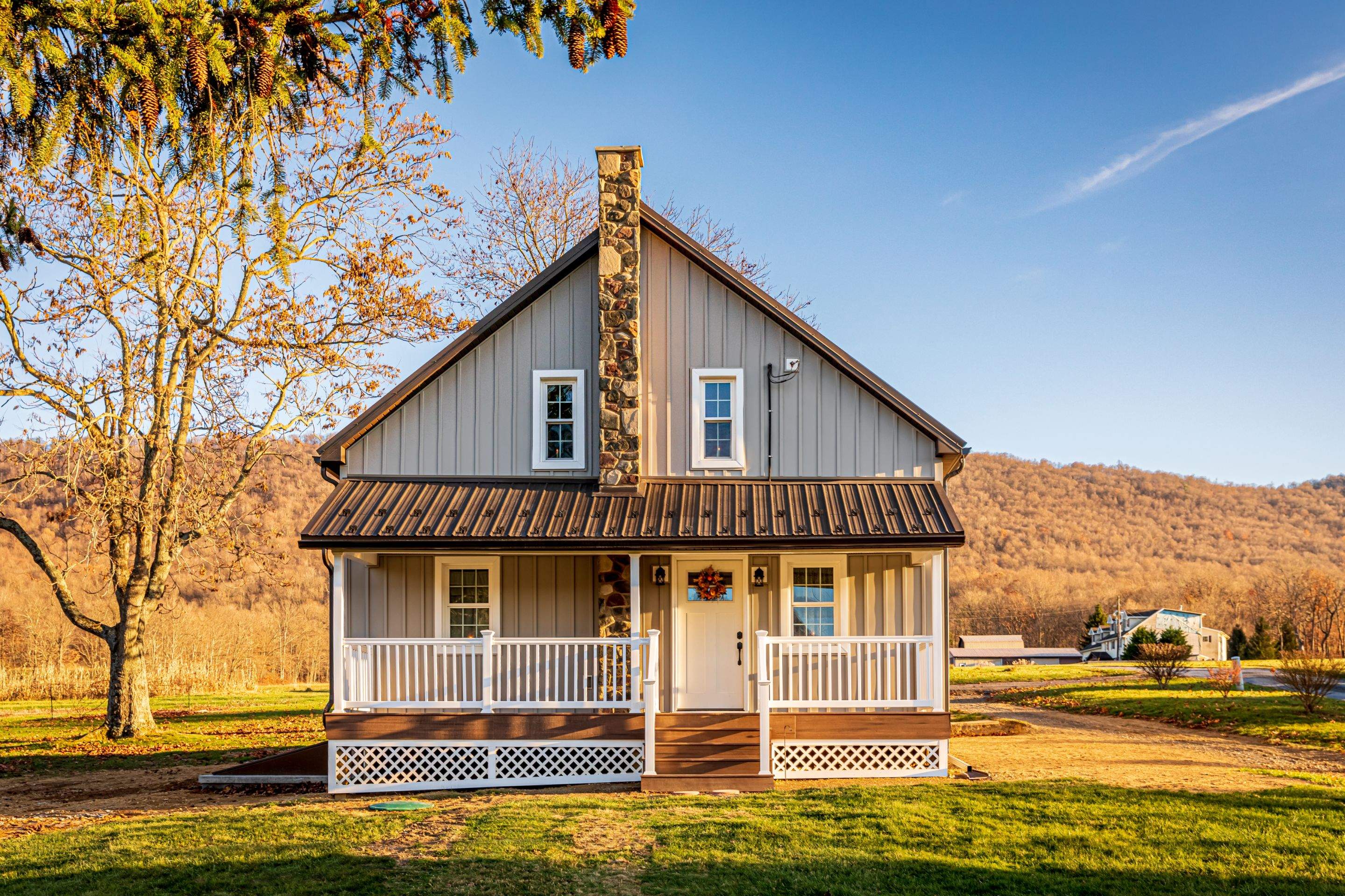 Metal roof-charcoal  Metal siding-ash gray by Esh Builders