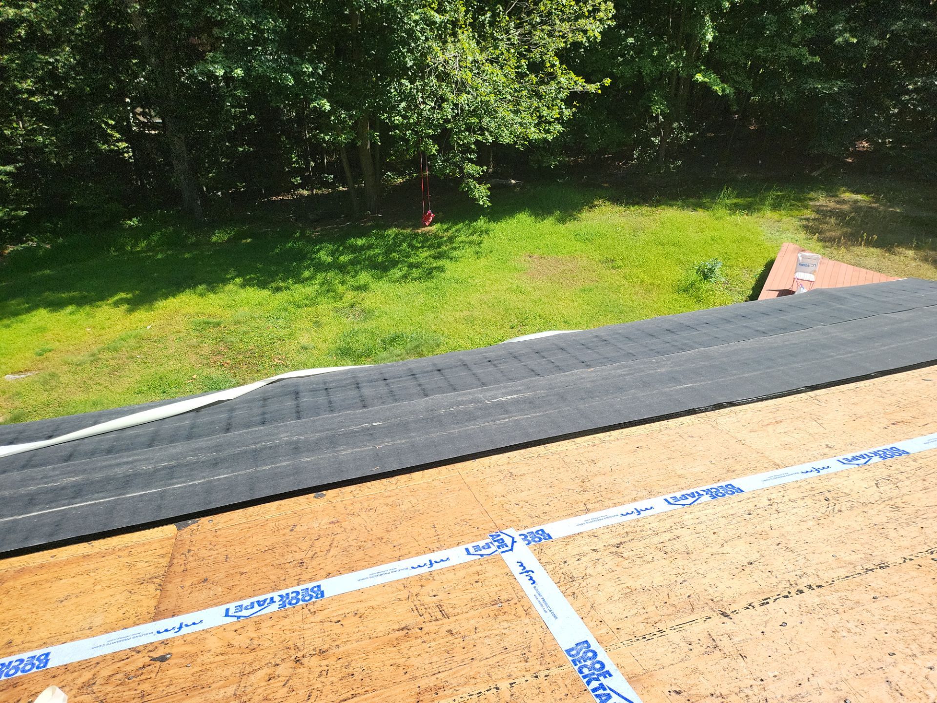 Commercial Roofing Installation using Owens Corning TruDefinition Duration AR - Harbor Blue by A Plus Exterior