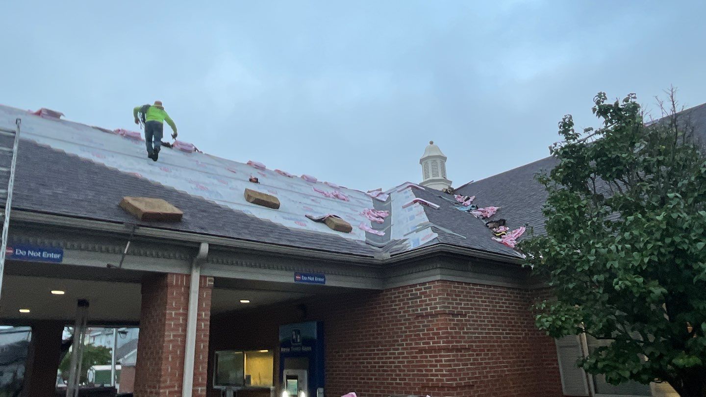 Commercial Roofing Installation using Performance Shingles by Mr. Roofer